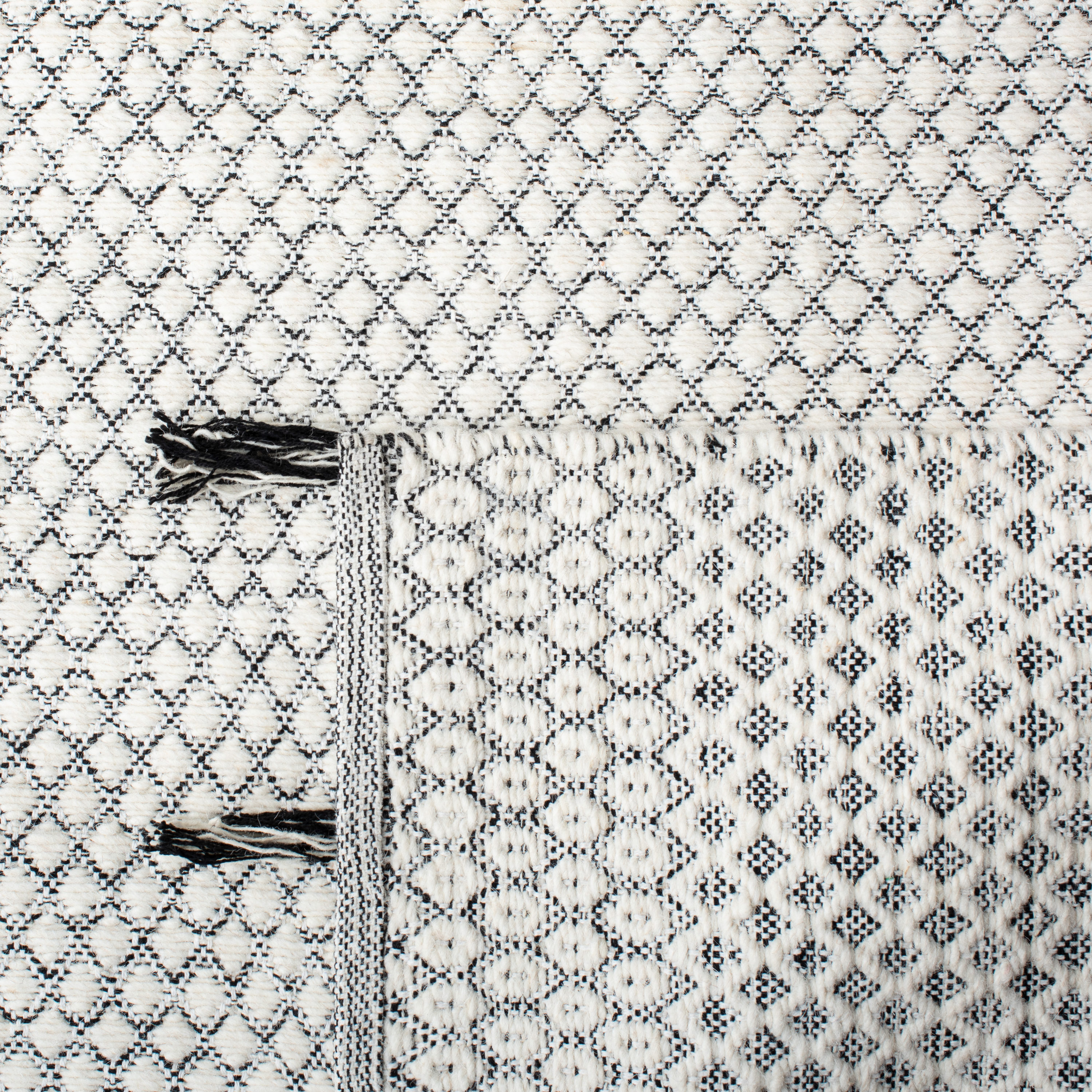 Handwoven Black and Ivory Cotton-Wool Blend Ikat Area Rug