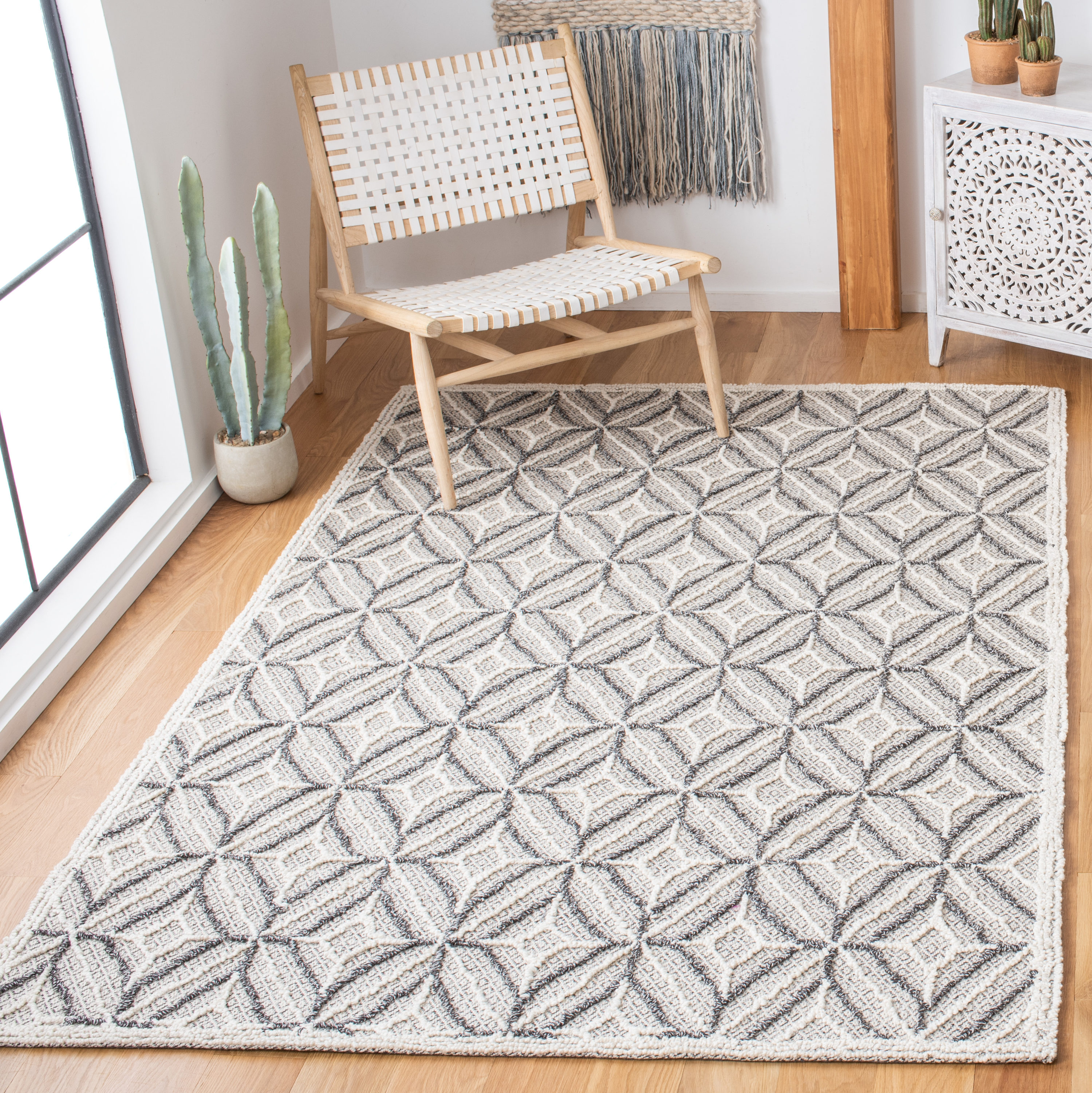 Elegant Trace 6' Hand-Tufted Black Wool Round Rug
