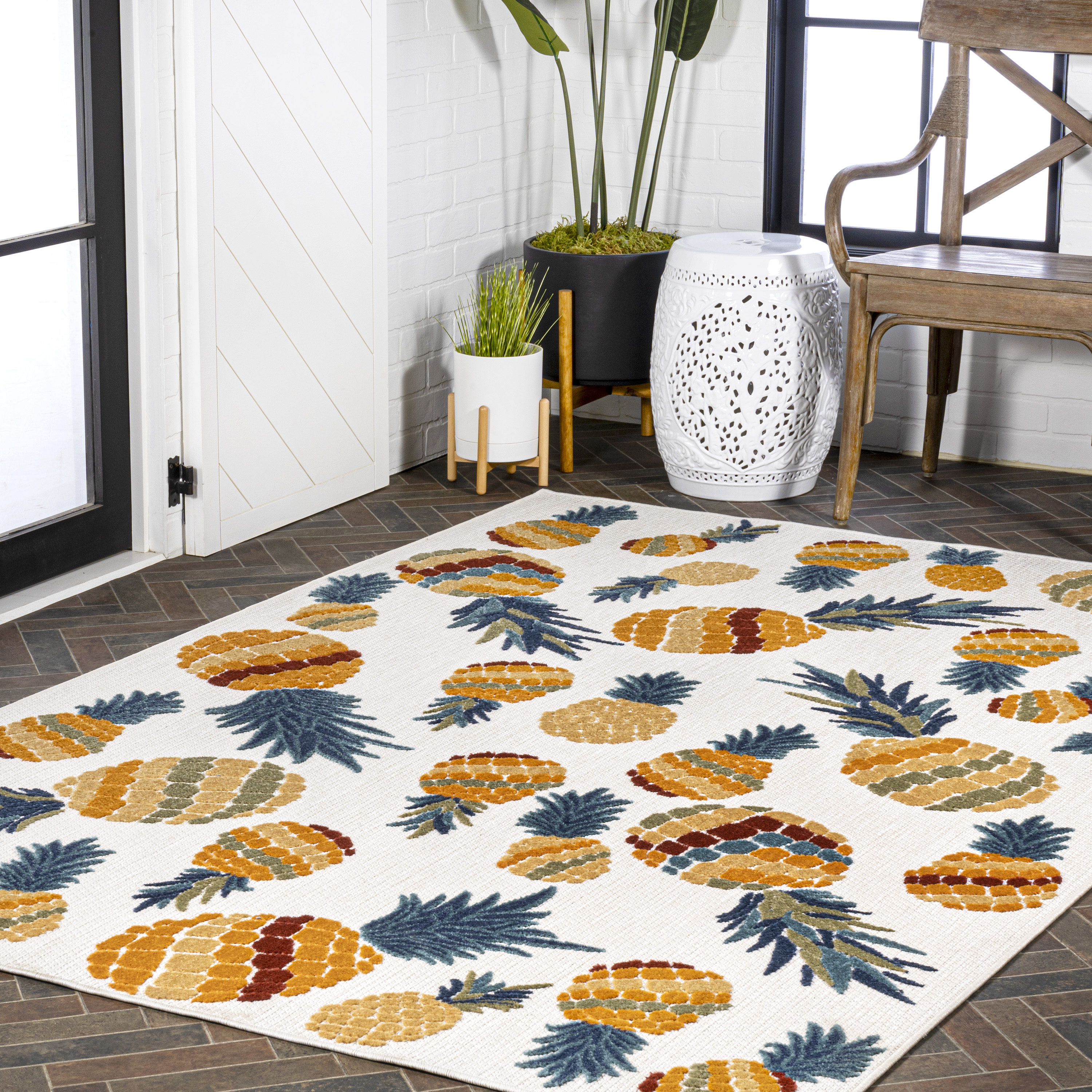 4' x 6' Ivory and Orange Floral Synthetic Area Rug