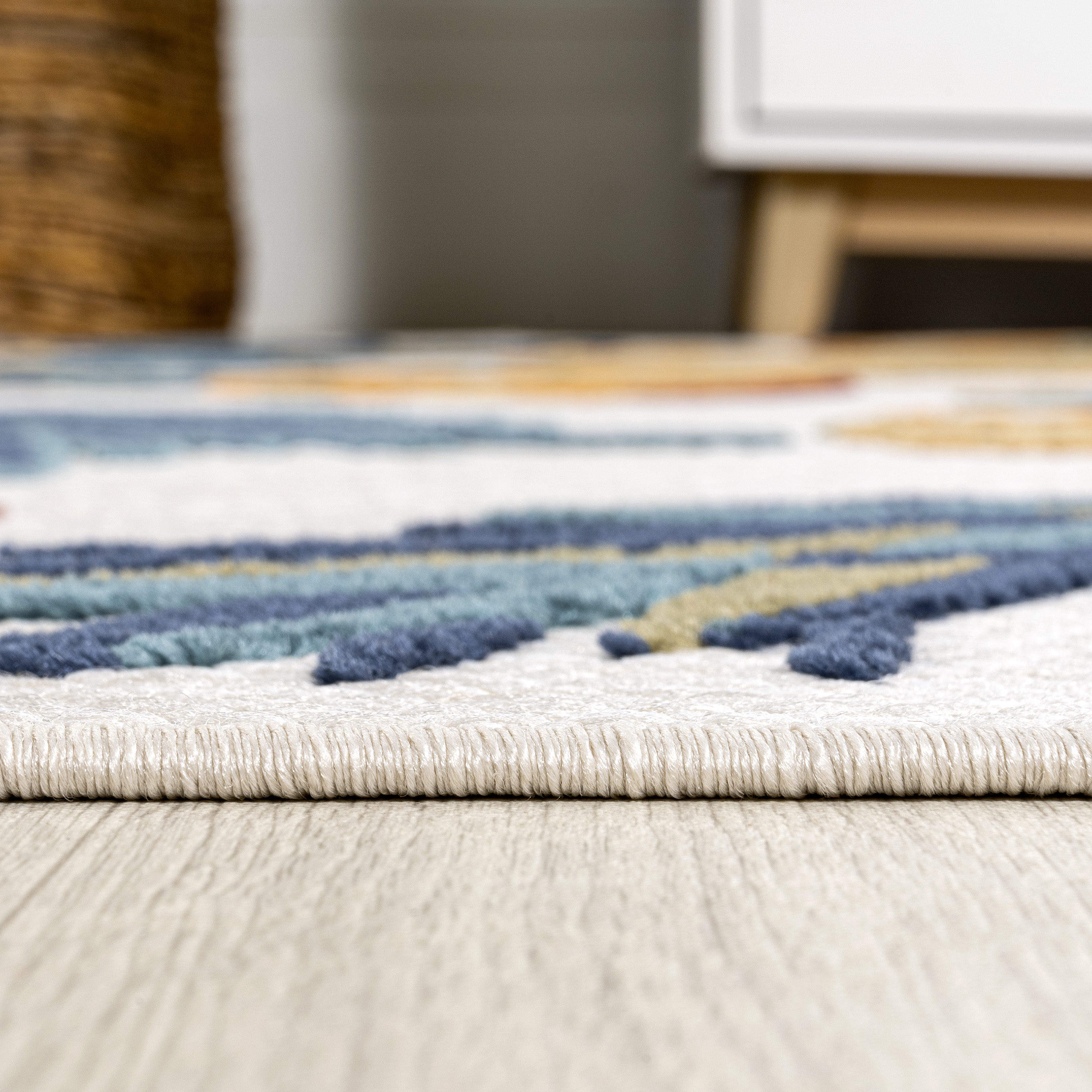 4' x 6' Ivory and Orange Floral Synthetic Area Rug