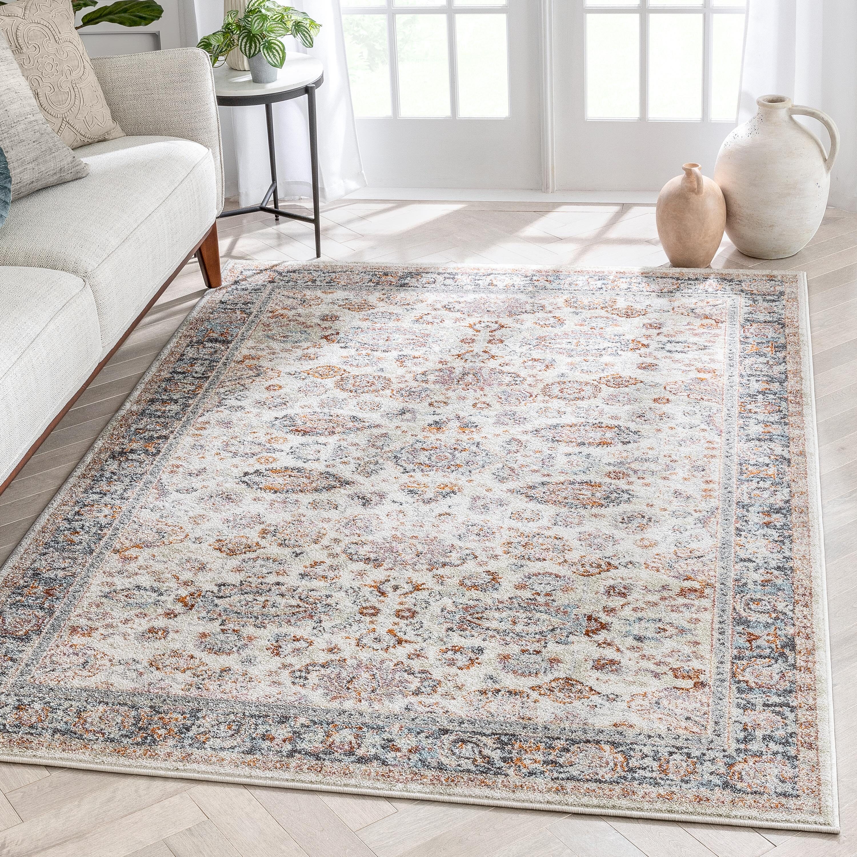 Ivory Floral Synthetic Reversible 5' x 7' Area Rug