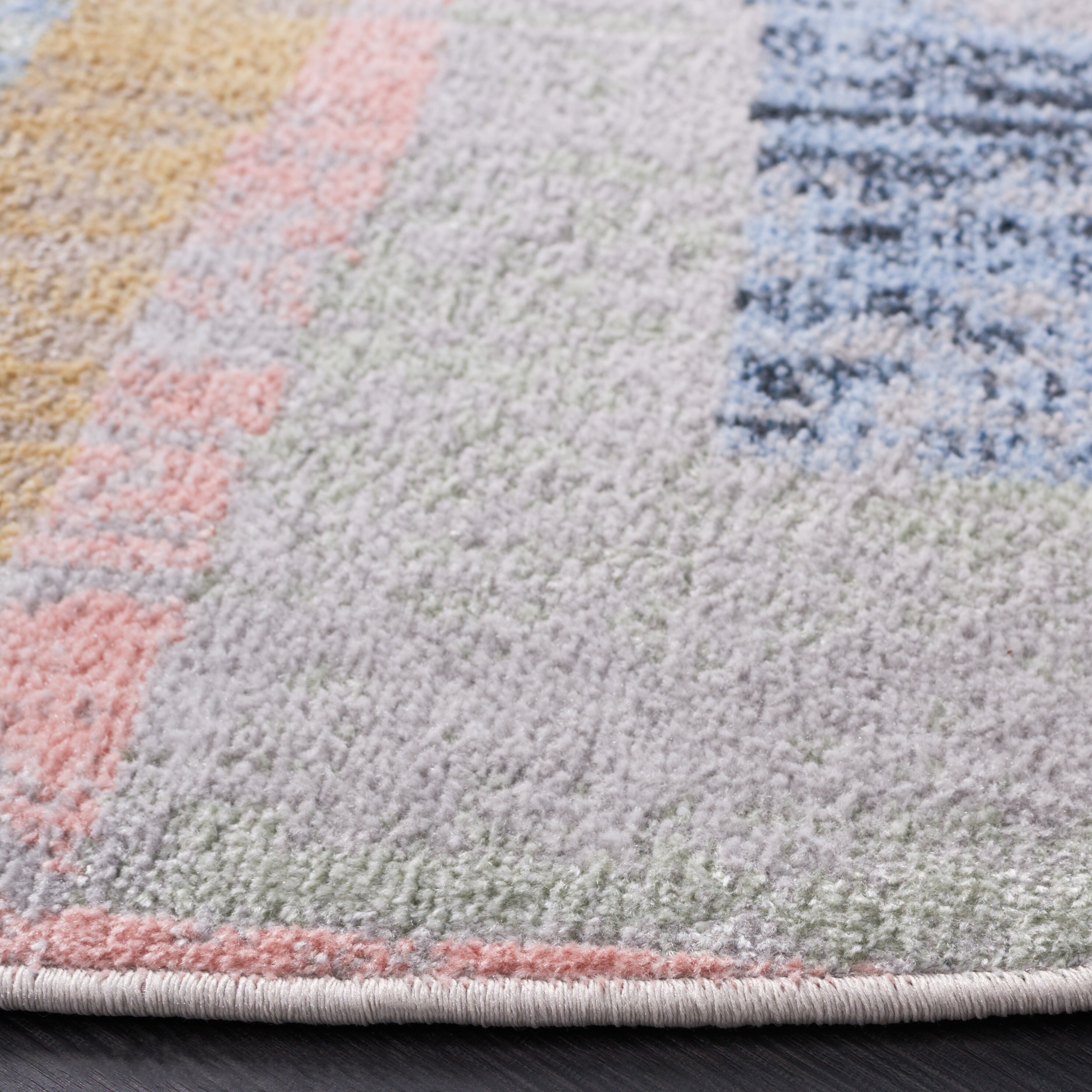 Ivory and Blue Rust Round Synthetic Area Rug, 6'7"