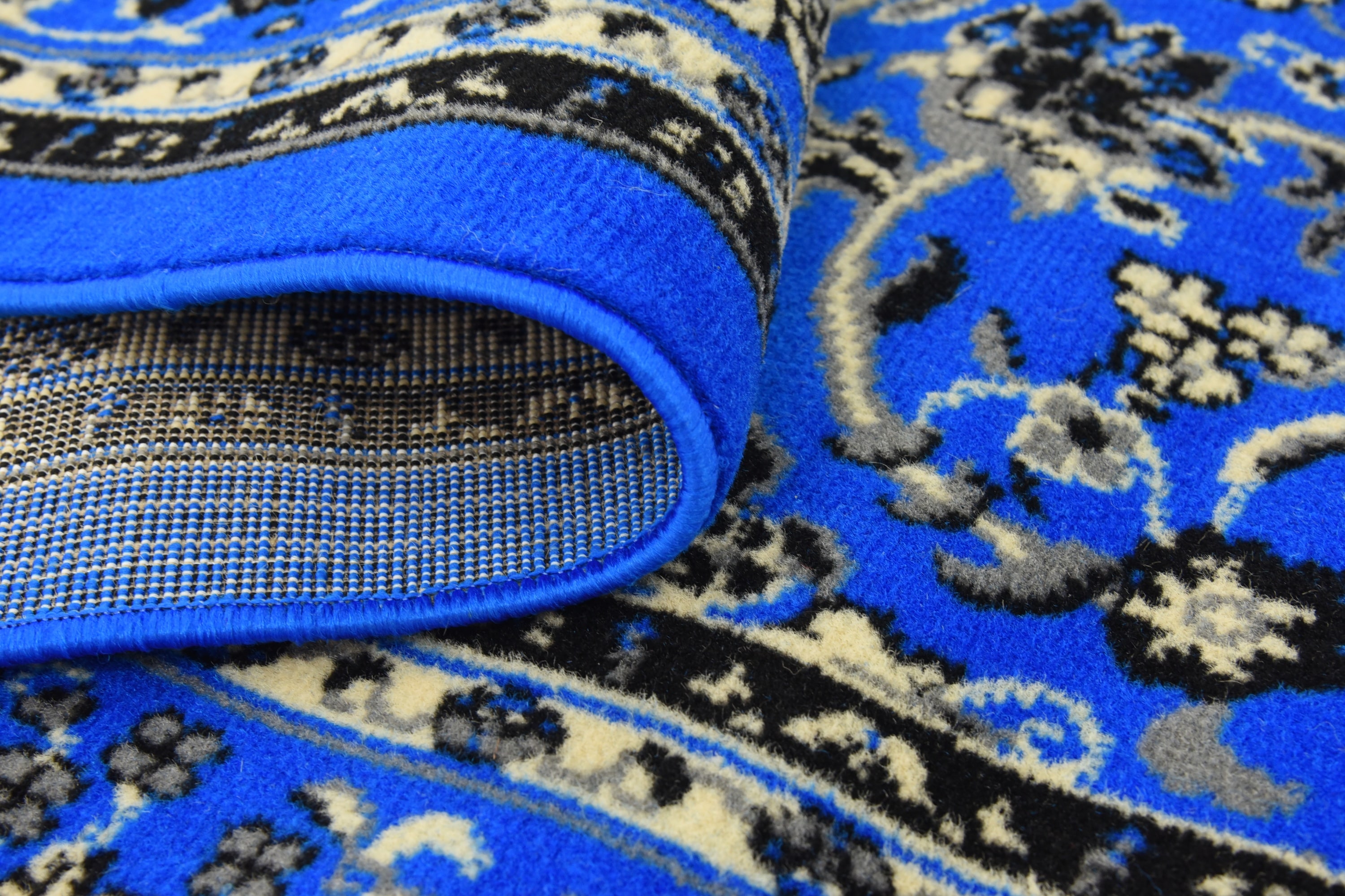 Blue and Ivory Synthetic Washable Reversible Area Rug