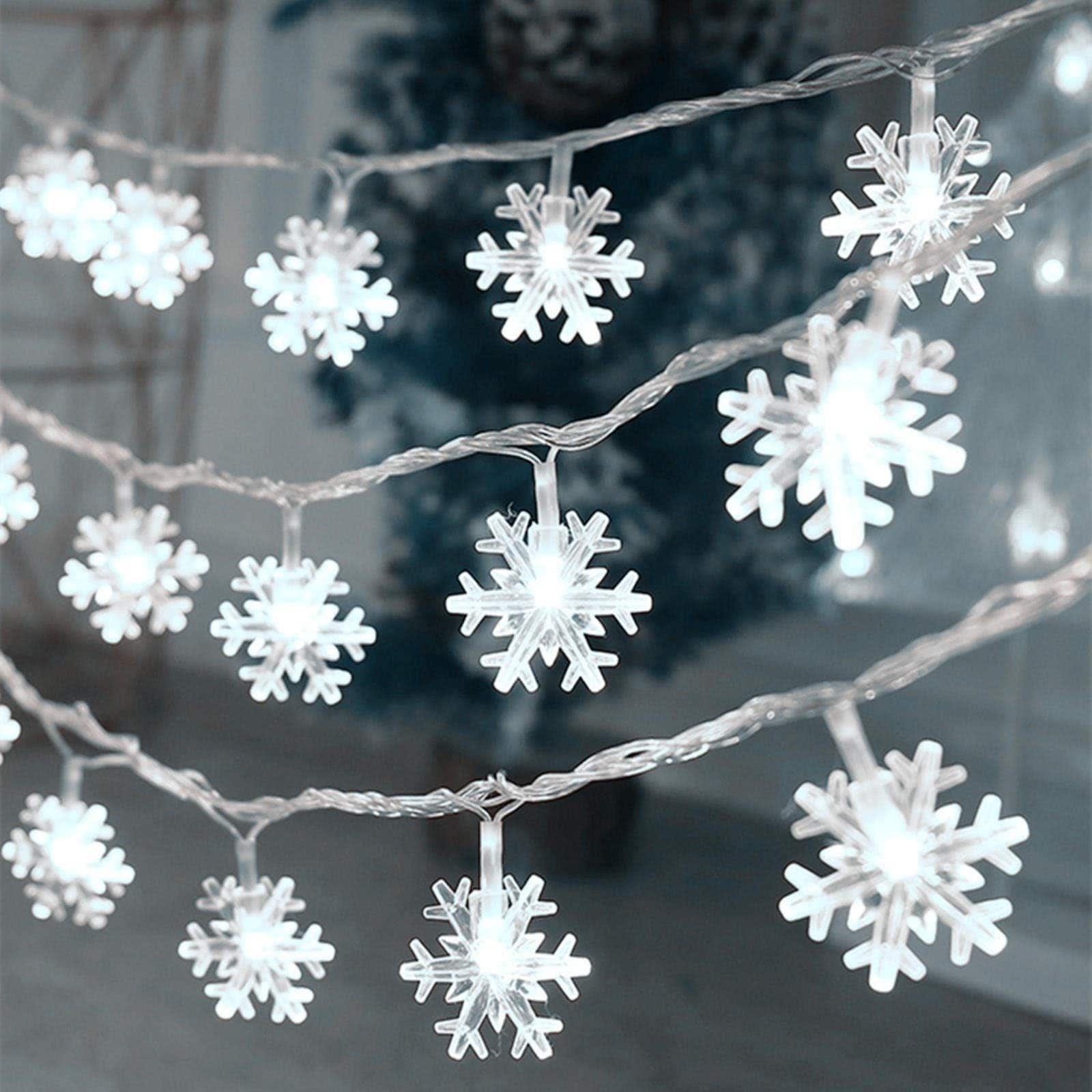 Knojodu  Cool White 20 Ft 40 LED Snowflake String Lights Battery Operated Waterproof Fairy Lights for Indoor Outdoor Christmas Tree Bedroom Patio Party Decor