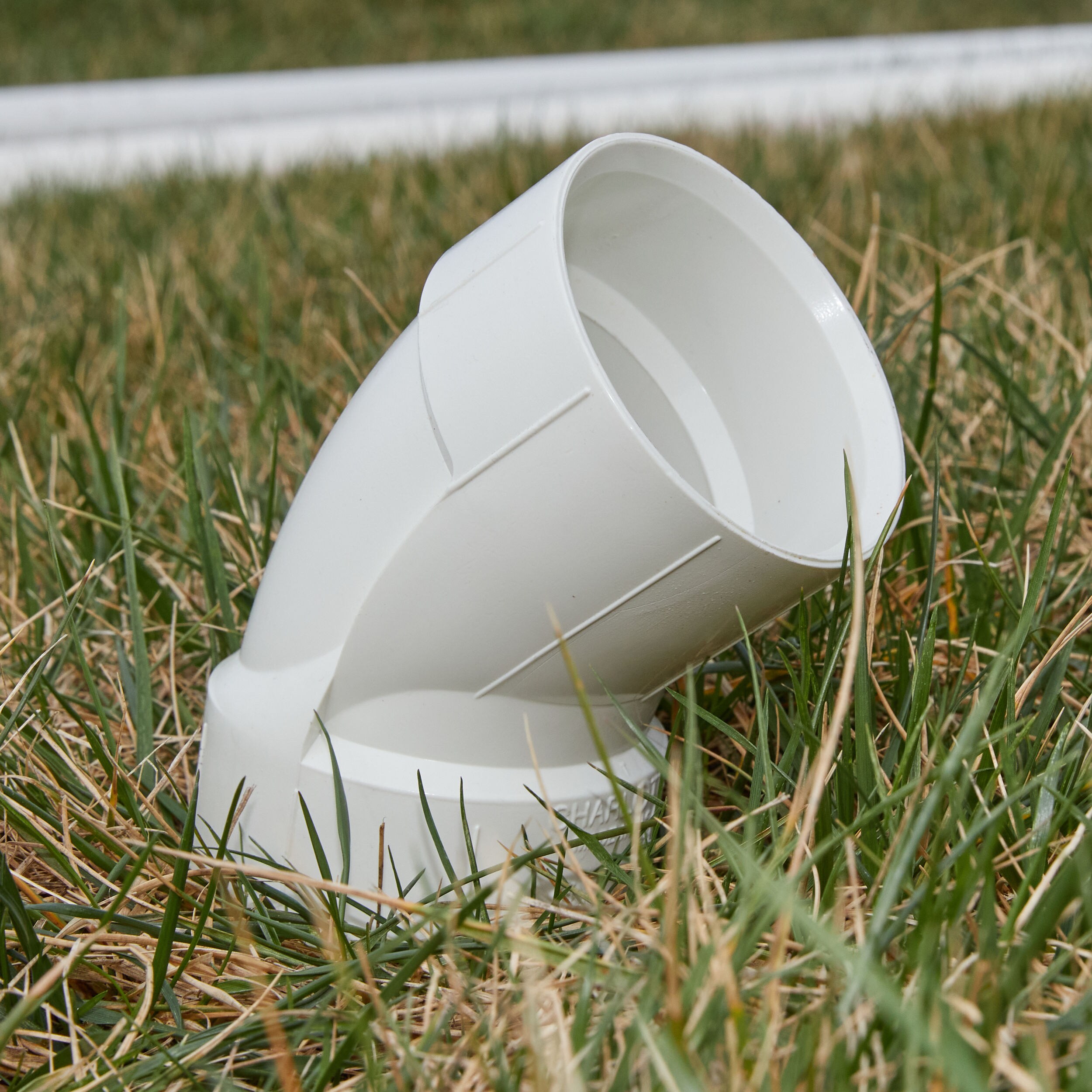Charlotte Pipe 4-in x 4-in PVC DWV Hub 45 Degree Elbow for Sanitary Drain, Waste, and Vent Applications