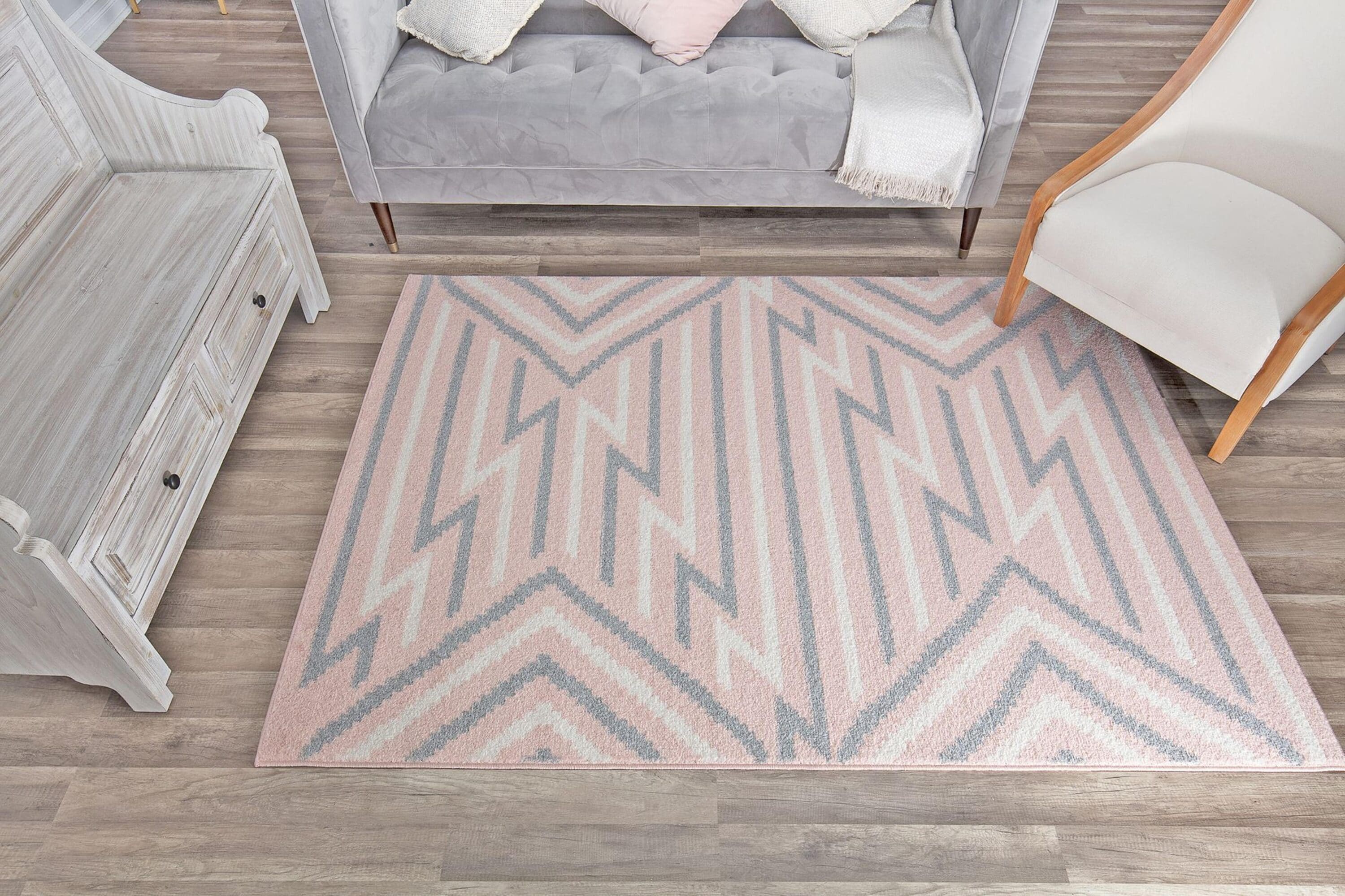 6' x 9' Gray and Pink Geometric Synthetic Area Rug