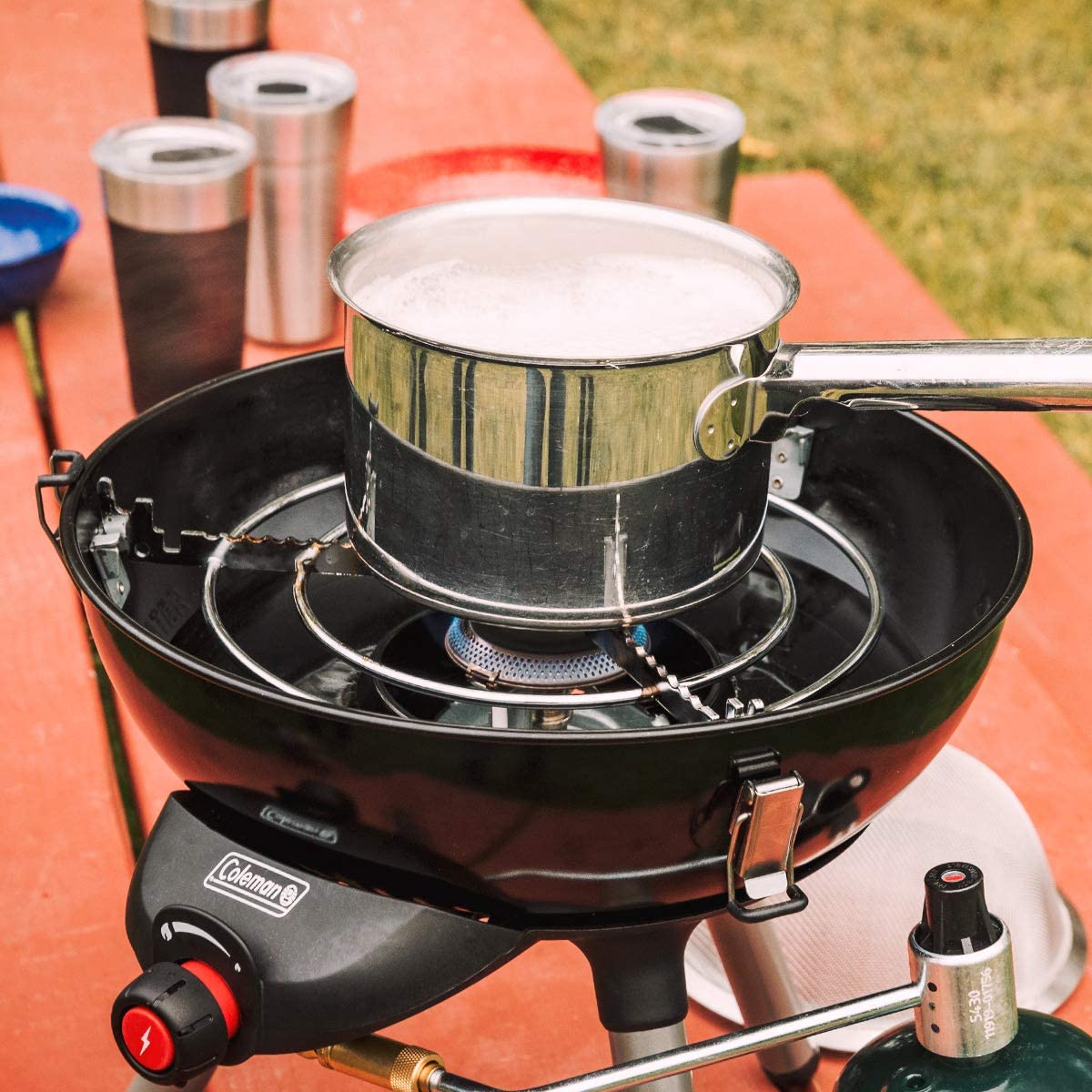 Coleman 4-in-1 Portable Propane Camping Stove, Includes Stove, Wok, Griddle  & Grill; Camping Grill with Instastart Ignition, Grease Tray, & 7000 BTUs