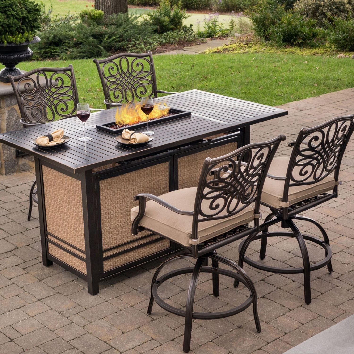 Hanover TRAD5PCFPBR Traditions 5 -Piece Bronze Patio Dining Set Aluminum Rectangle Table with 4 Tan Cushions Swivel Chairs Fire Pit Included