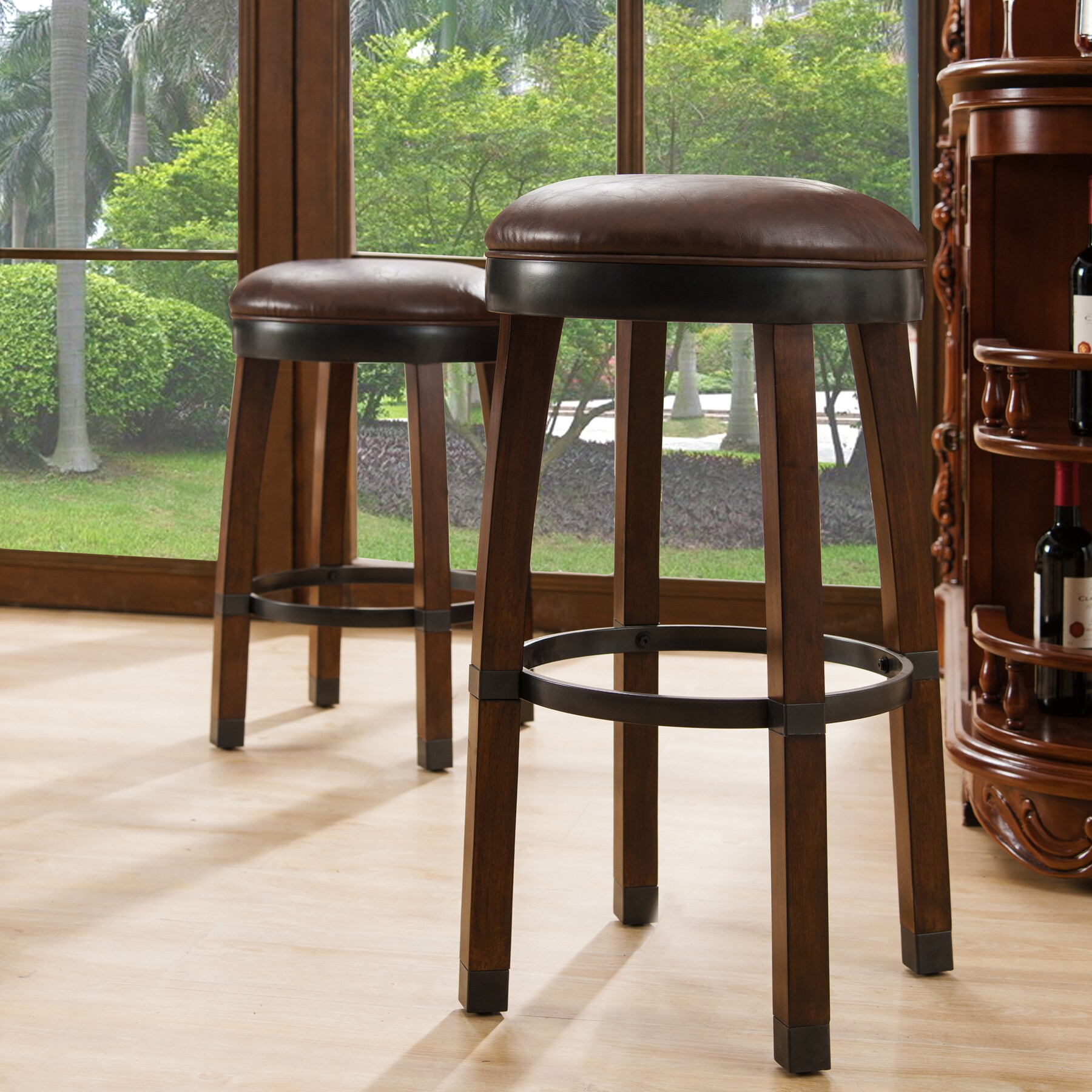 Sienna Swivel Saddle-Style Counter Stool in Brown Leather and Wood