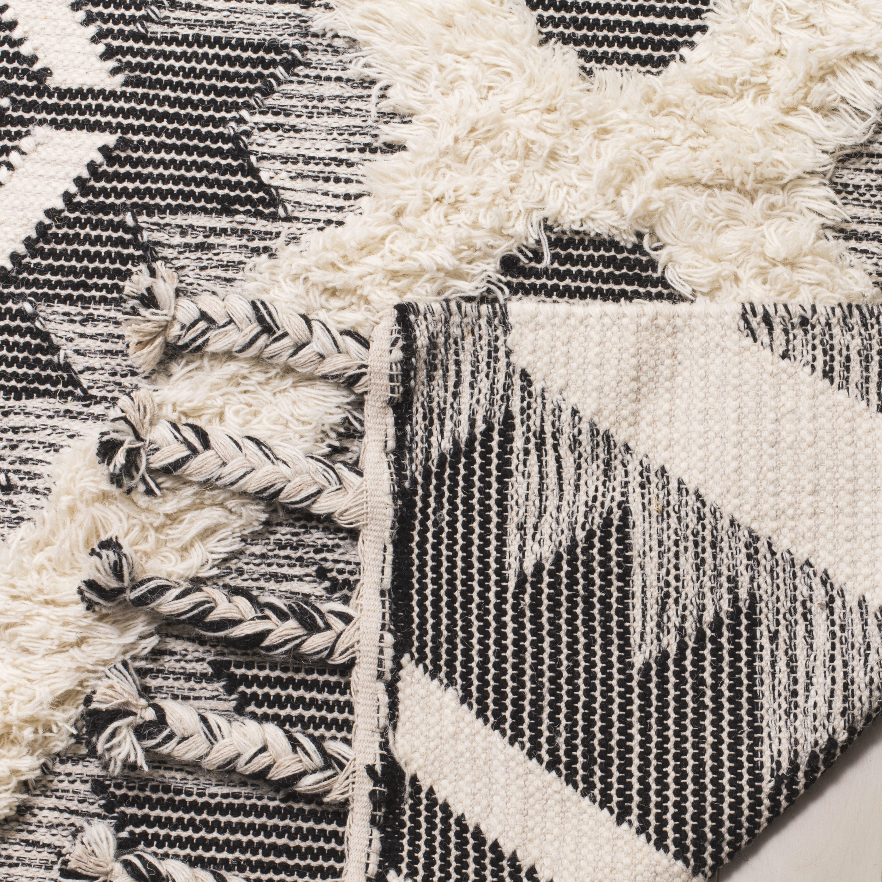 Handmade Black Wool 4' x 6' Rectangular Area Rug