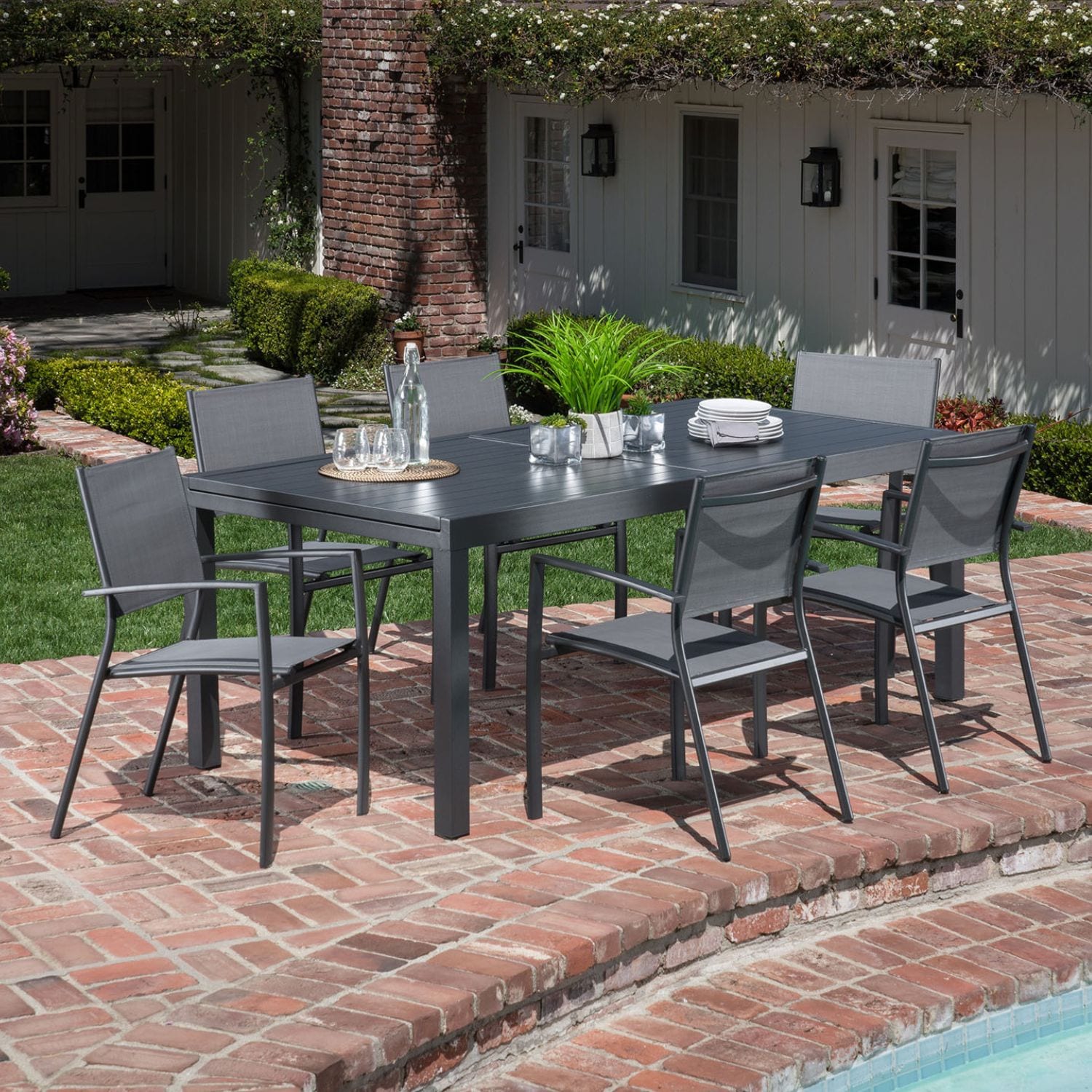 Hanover NAPLESDN7PC-GRY Naples 7 -Piece Gray Patio Dining Set Extendable Table Aluminum Rectangle Table with 6 Gray Stackable Stationary Chairs
