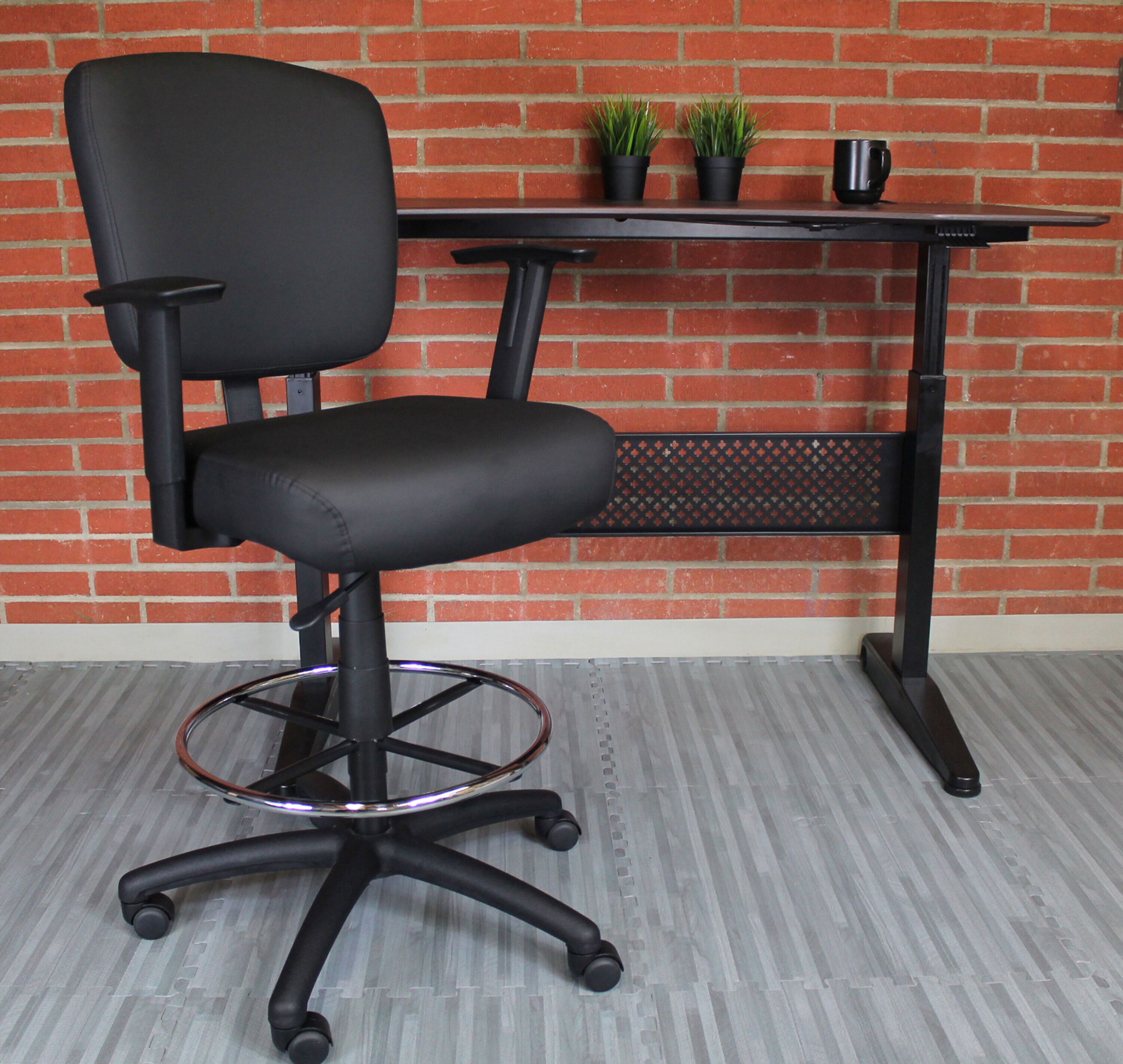 Oversized Black Drafting Stool with Chrome Footring and Adjustable Arms