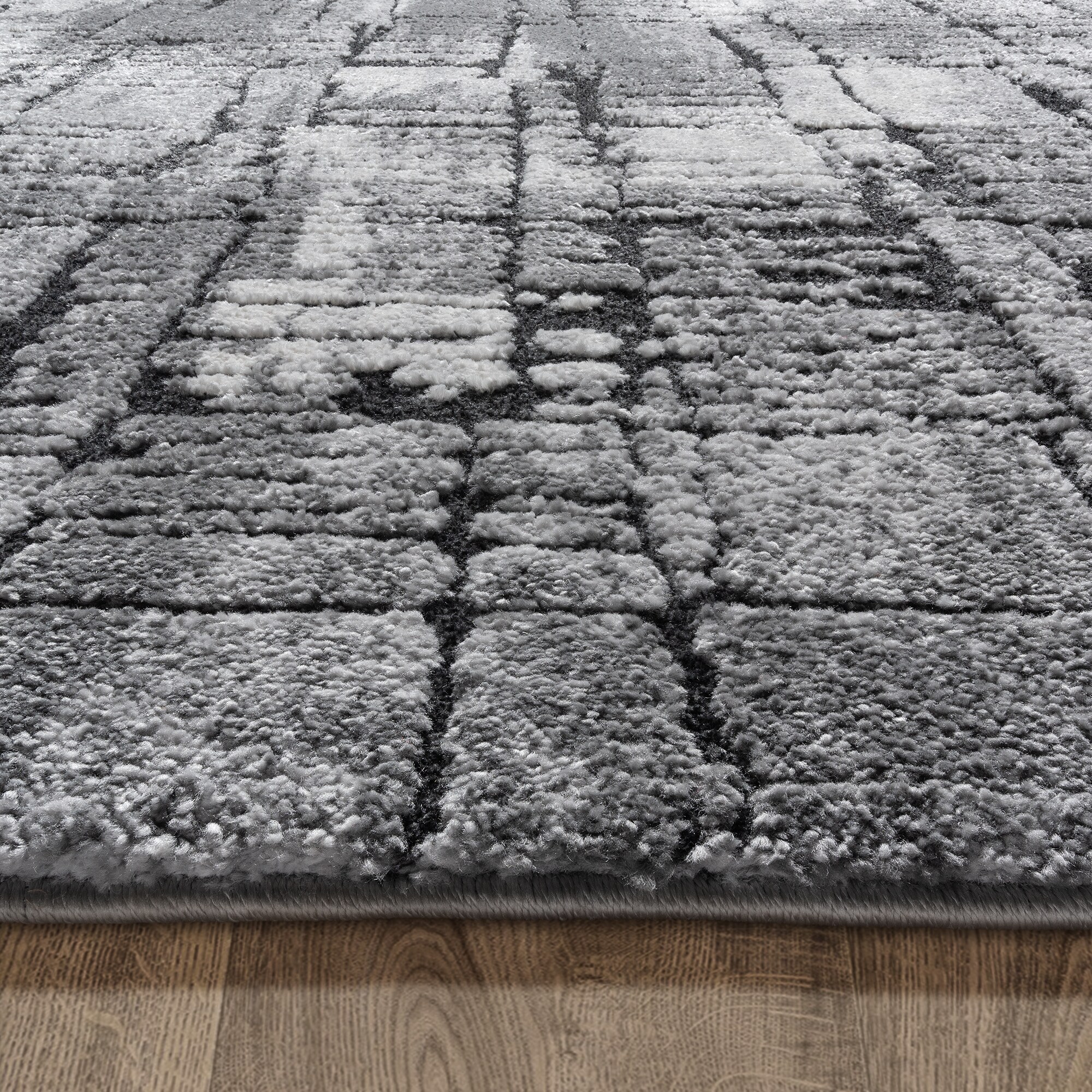 Imani 6' x 9' Black and Gray Abstract Shag Rug