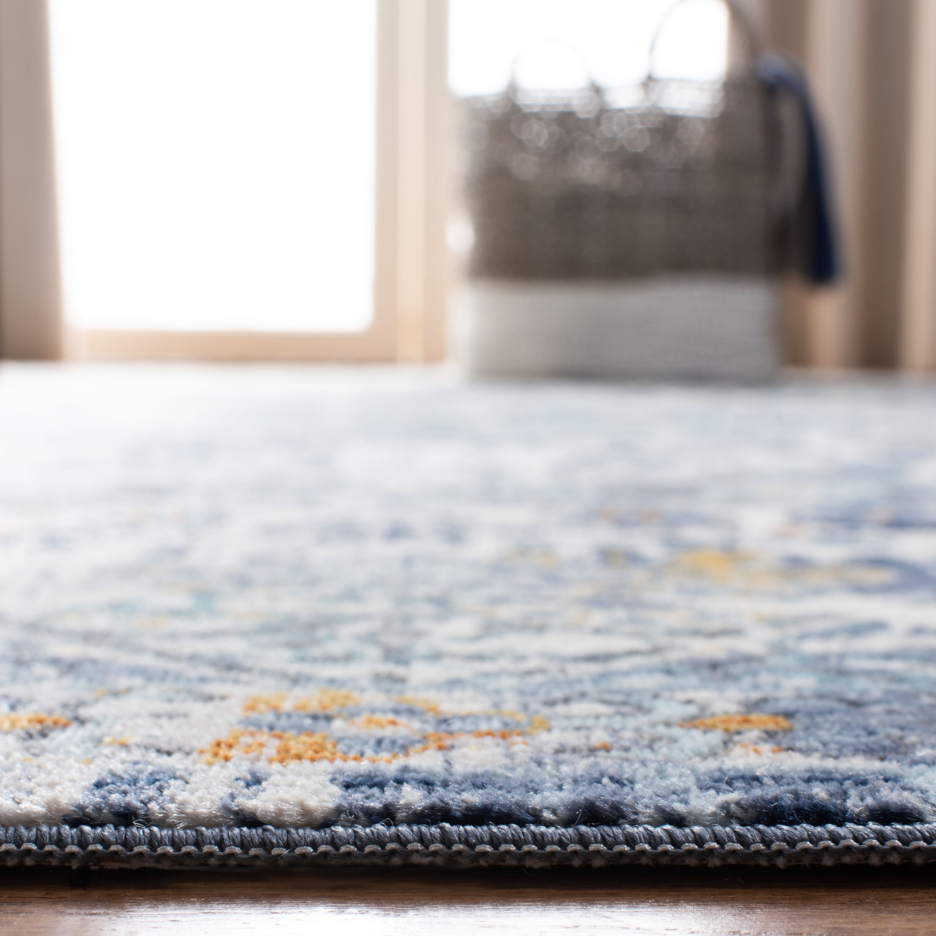 Ivory and Navy Floral Geometric Wool Area Rug