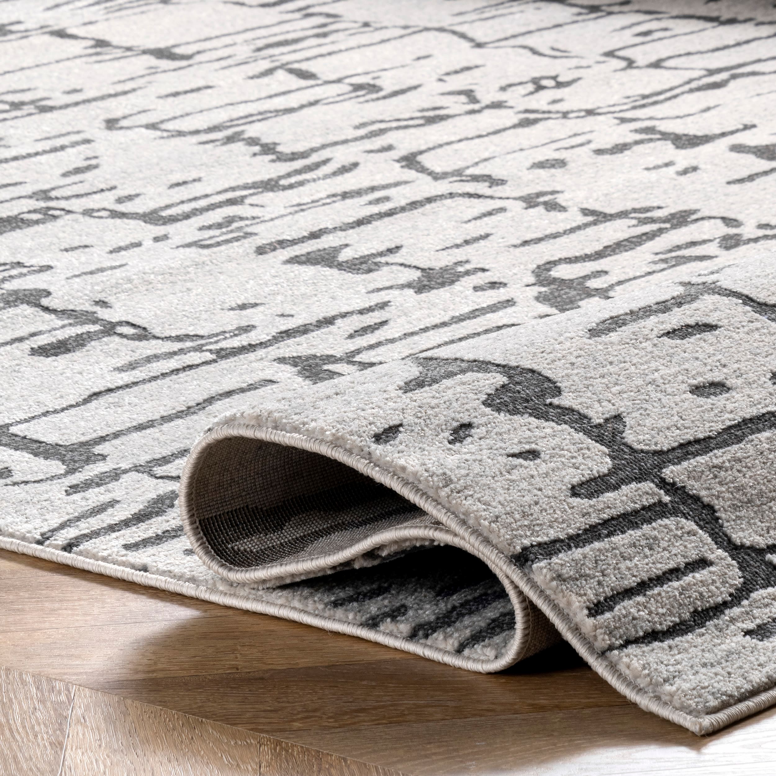 Ivory Tufted Reversible Abstract Synthetic 4' x 6' Area Rug