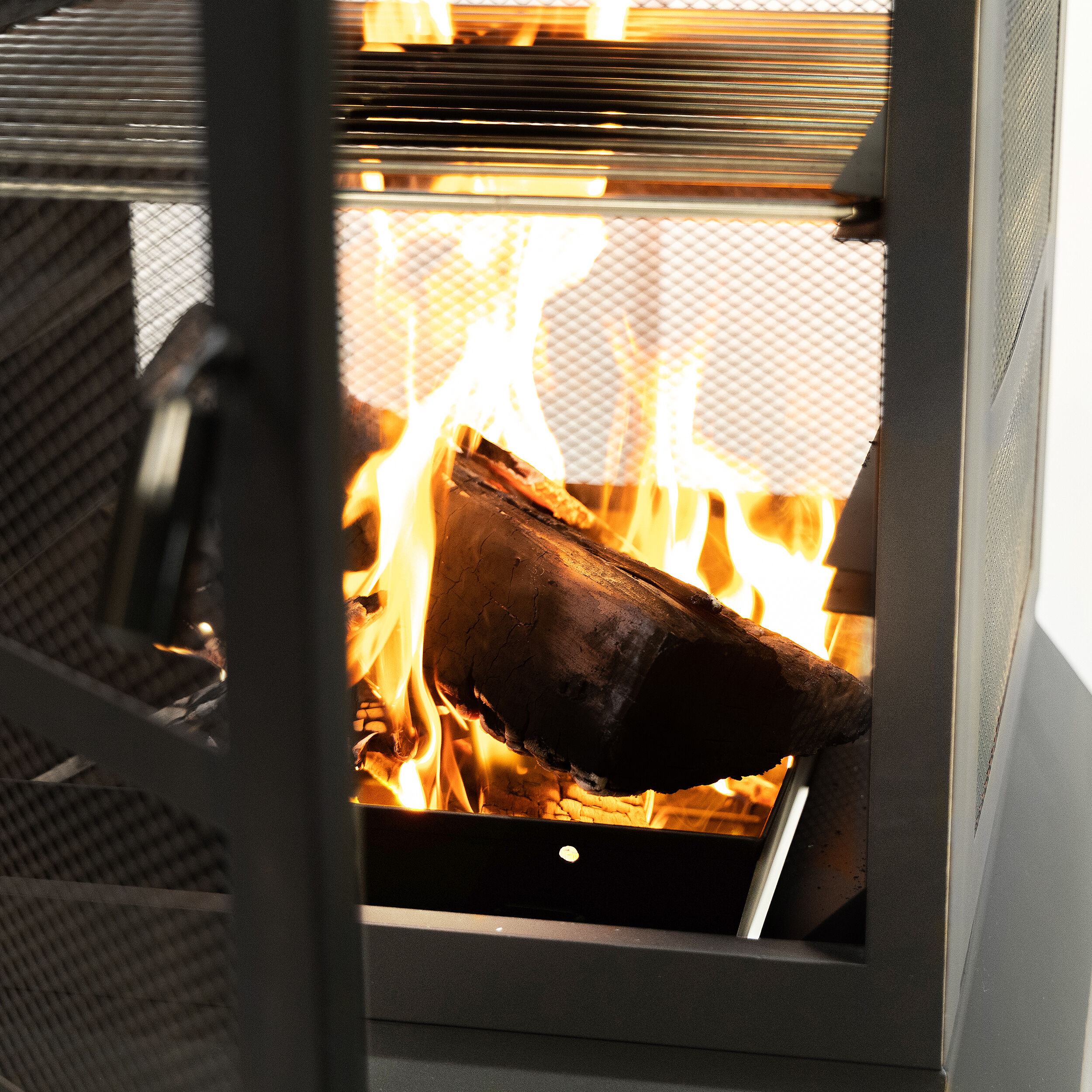Black Steel Wood Burning Fire Pit with Log Storage