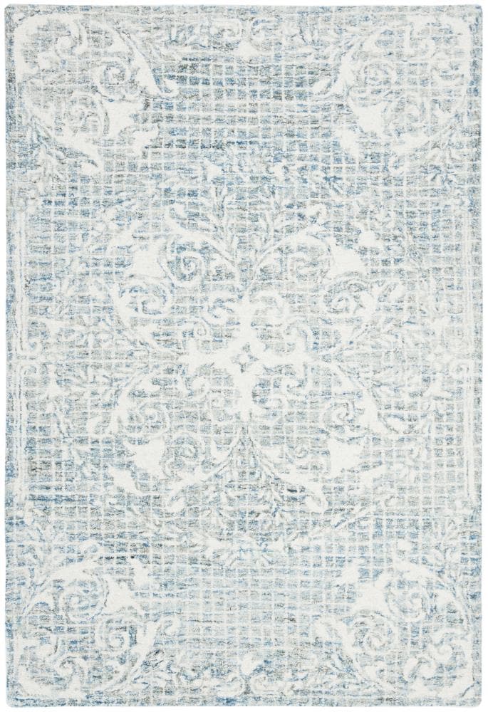Handmade Abstract Round Tufted Light Blue Wool Blend Area Rug, 4' x 6'