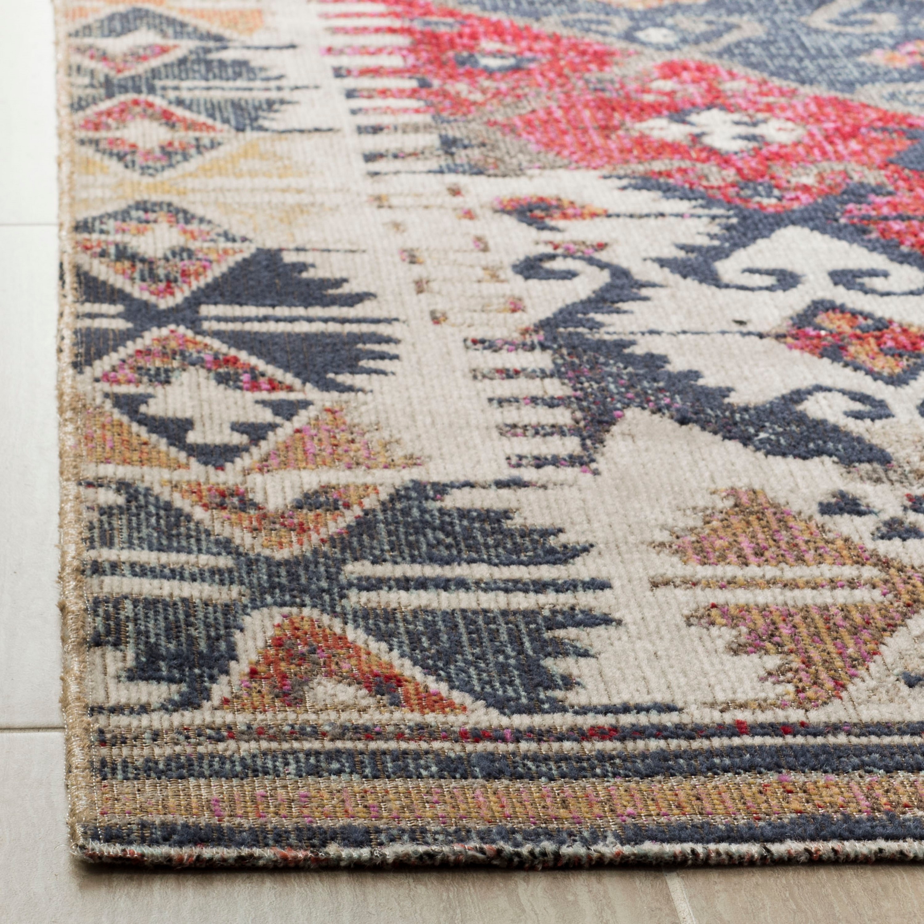 Rust and Multicolor Geometric 8' x 10' Synthetic Area Rug