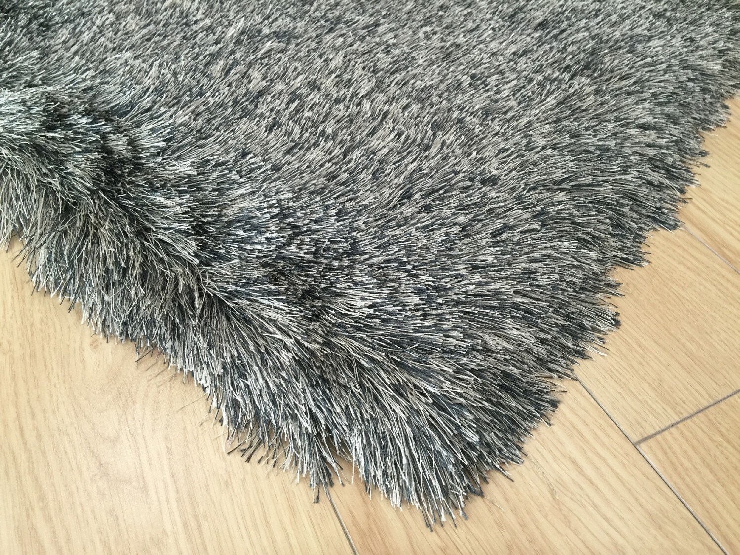 Amazing Rugs NL1002-811 Fancy Shaggy 8 x 11 (ft) Tufted Polyester Gray Rectangular Indoor Solid Area rug