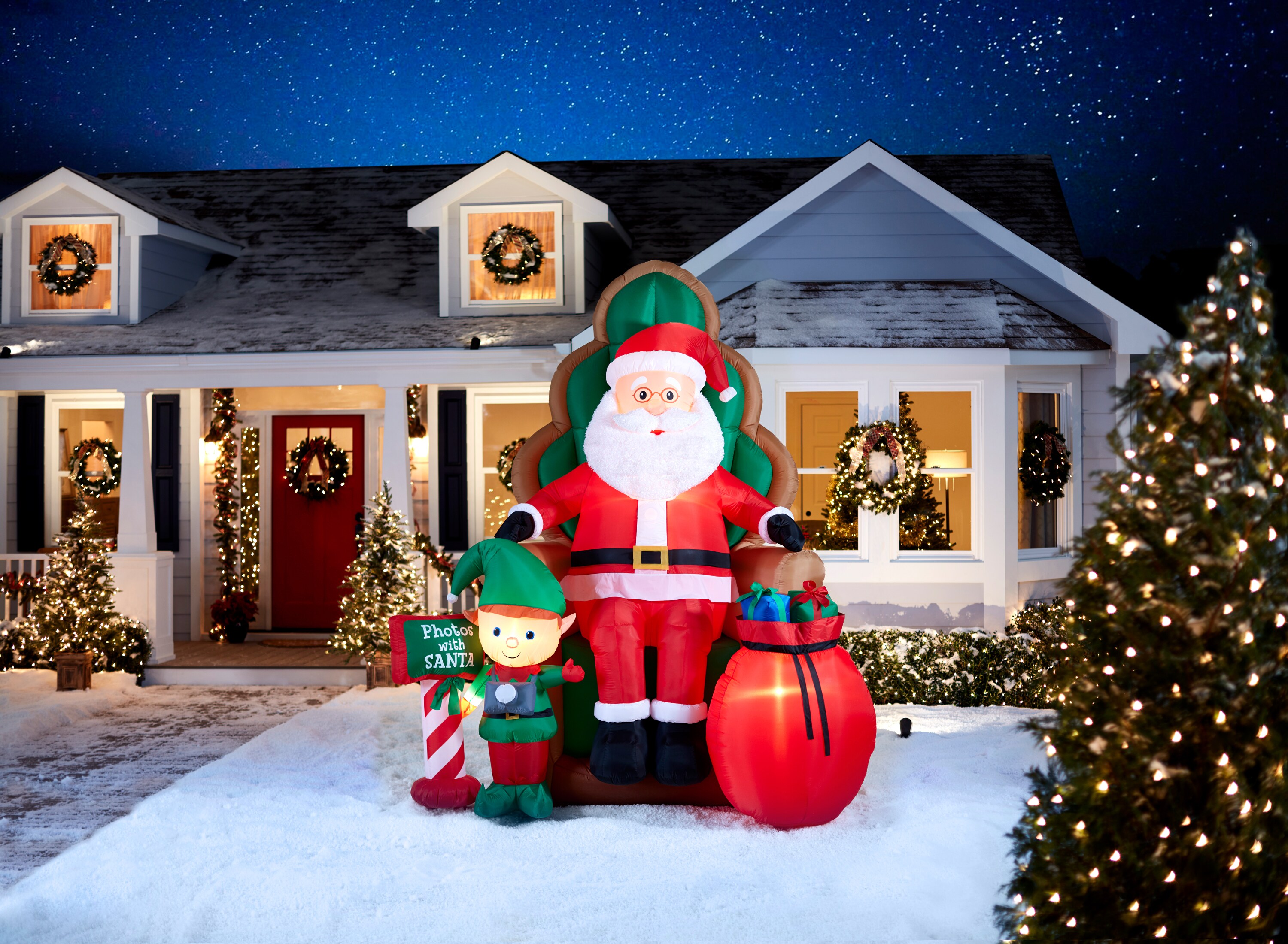 Holiday Living 10.01-ft Lighted Santa Christmas Inflatable in the ...