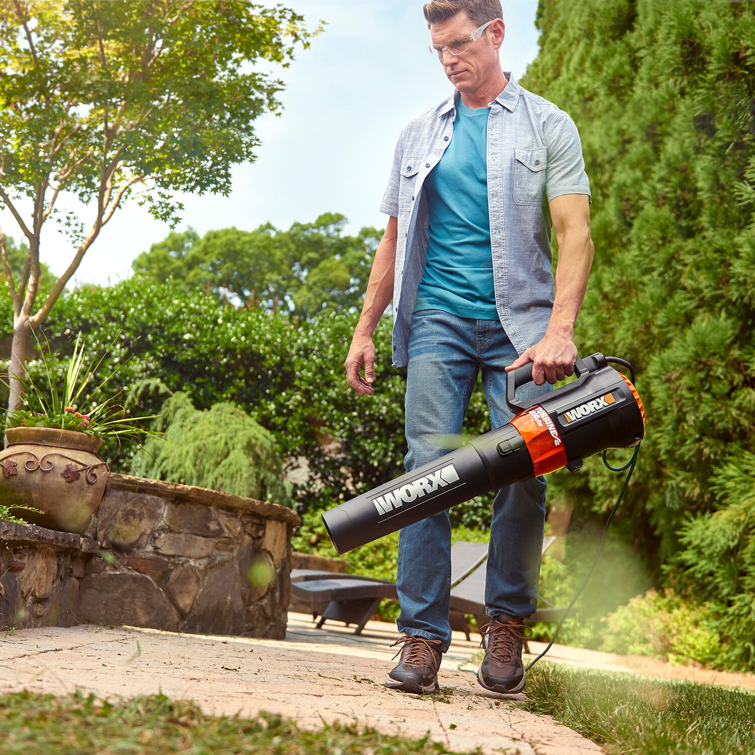 Image of Worx corded leaf blower with cord plugged in