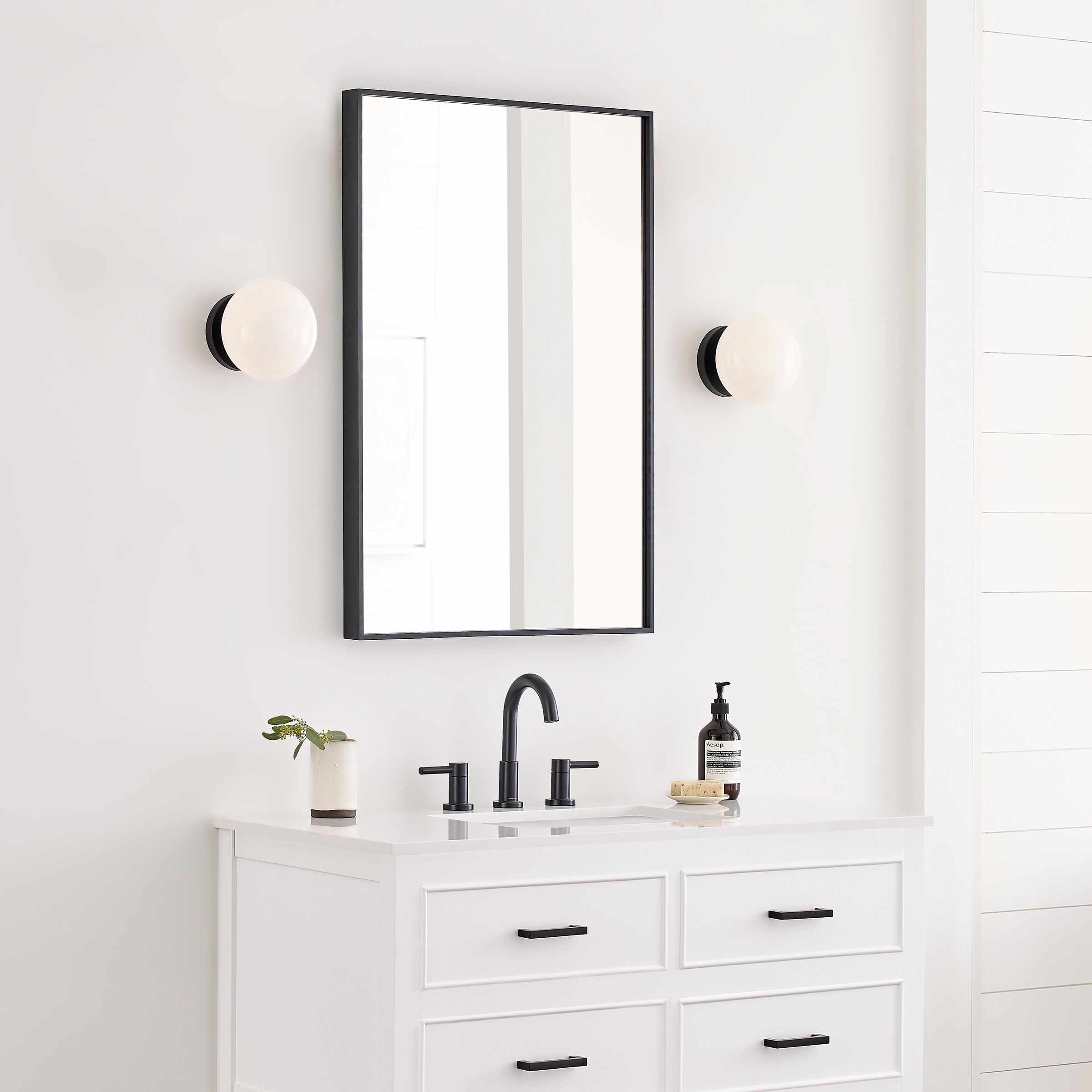 Lune Aged Iron and Milk White Glass Wall Sconce