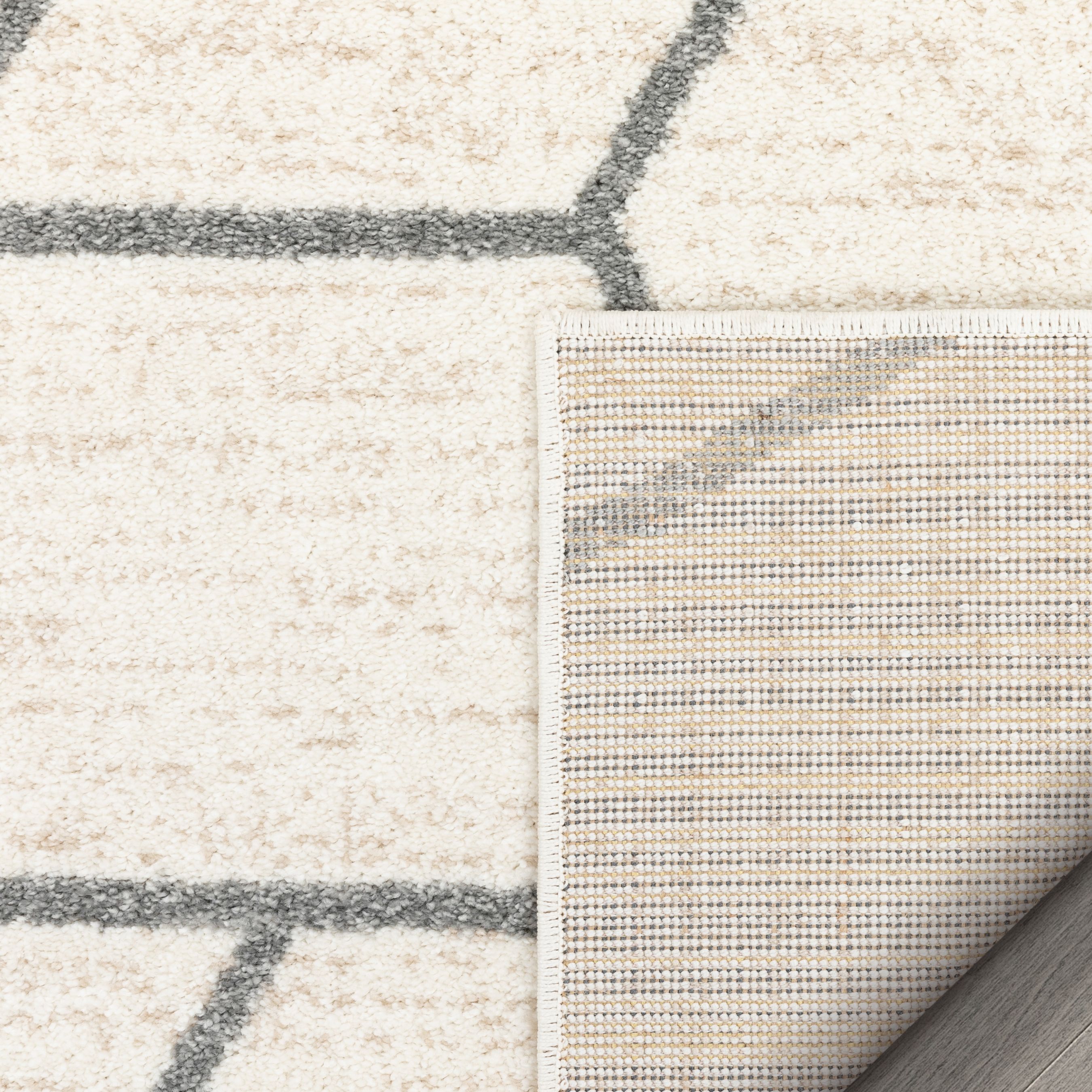 Ivory Geometric Synthetic Reversible Area Rug 3'11" x 5'3"