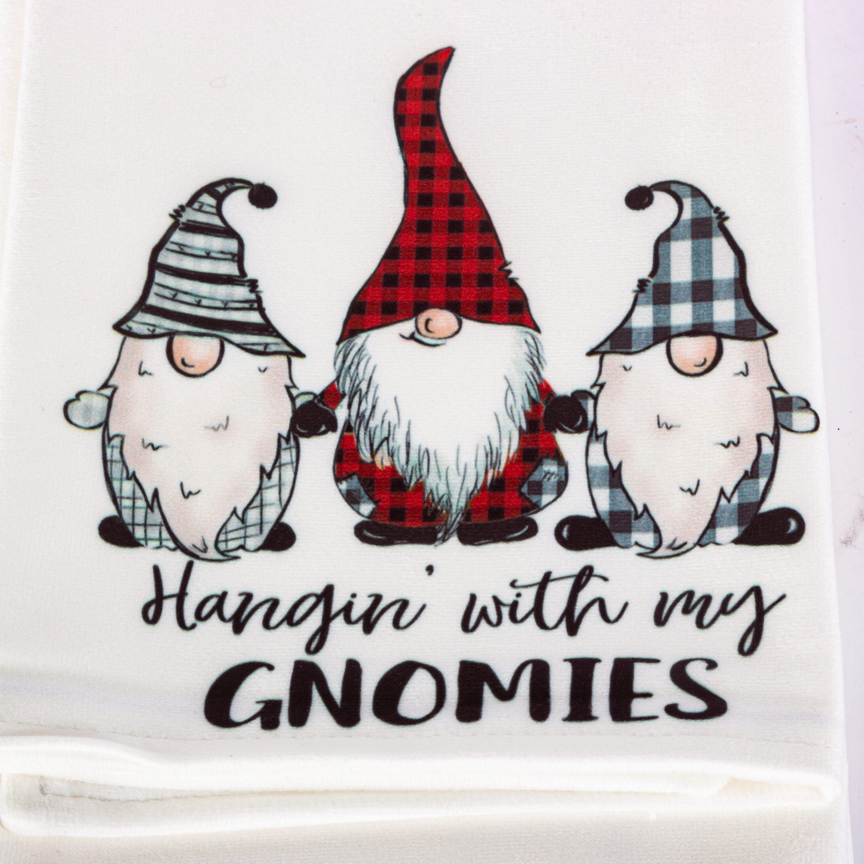 Flour sack tea towel with Santa Gnome in a cup of cocoa | Lee Embroidery LLC