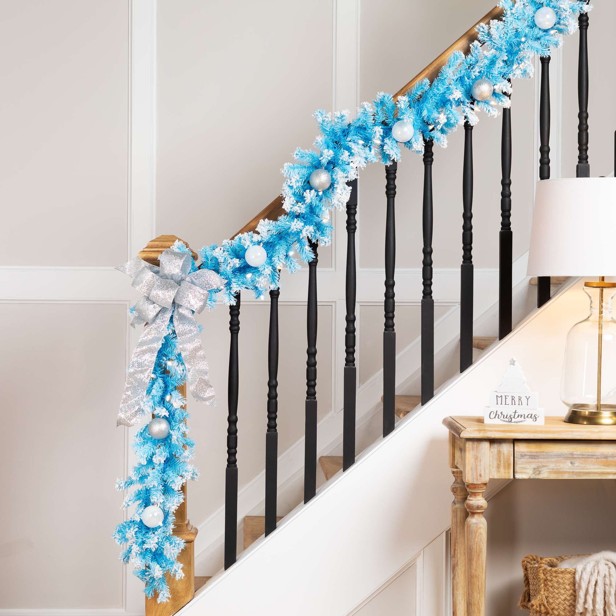 Northlight - Pre-Lit Artificial Flocked Pine Christmas Garland - 9 feet - Sky Blue - Clear Lights