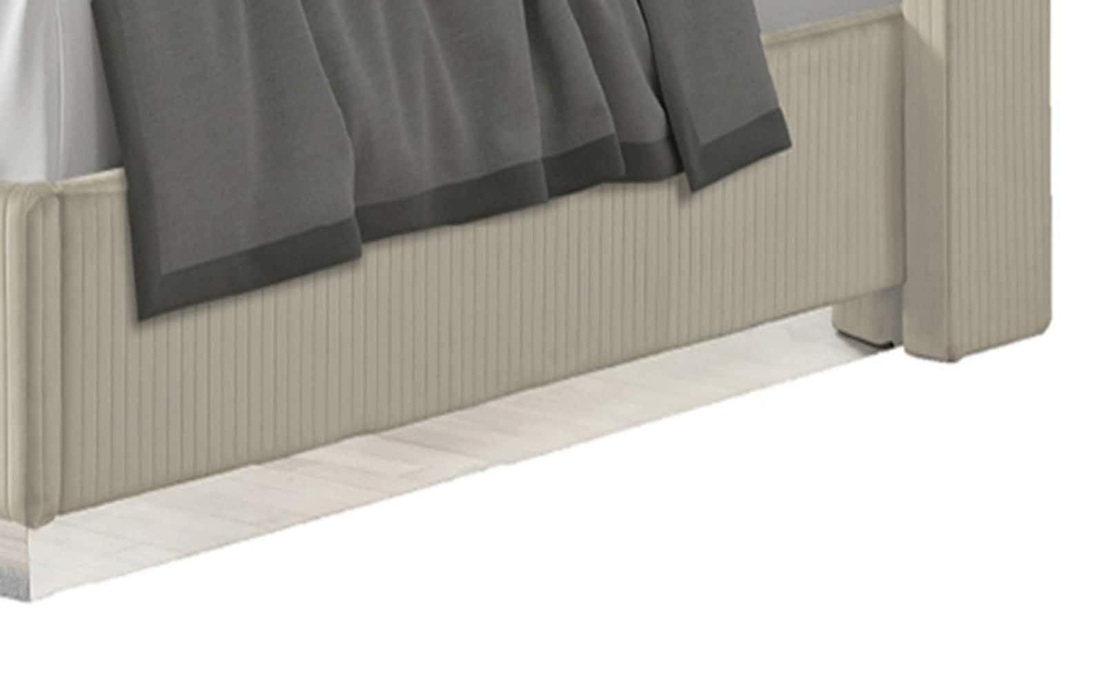 Elegant Beige Velvet King Bed with Ambient Fireplace Display
