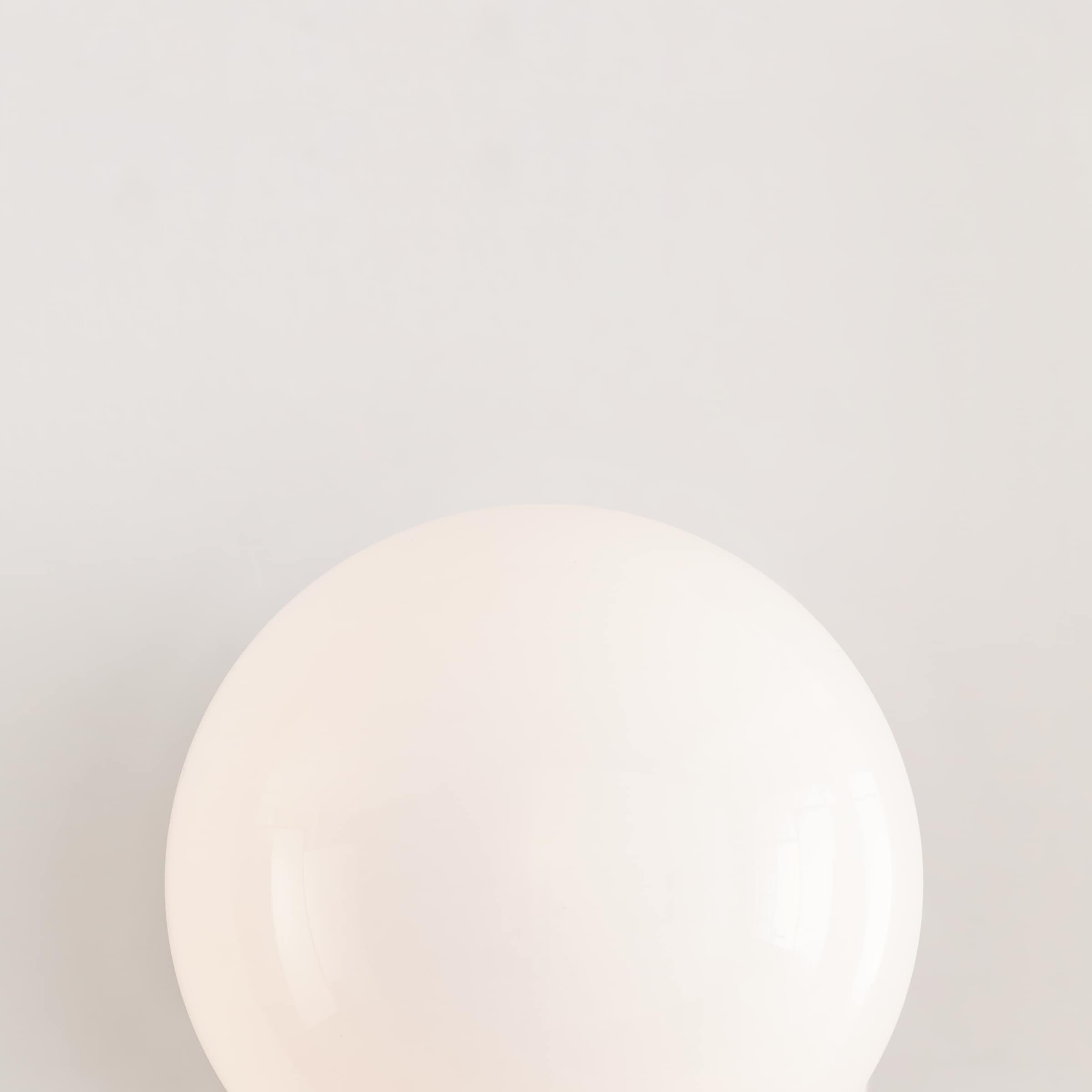 Lune Aged Iron and Milk White Glass Wall Sconce