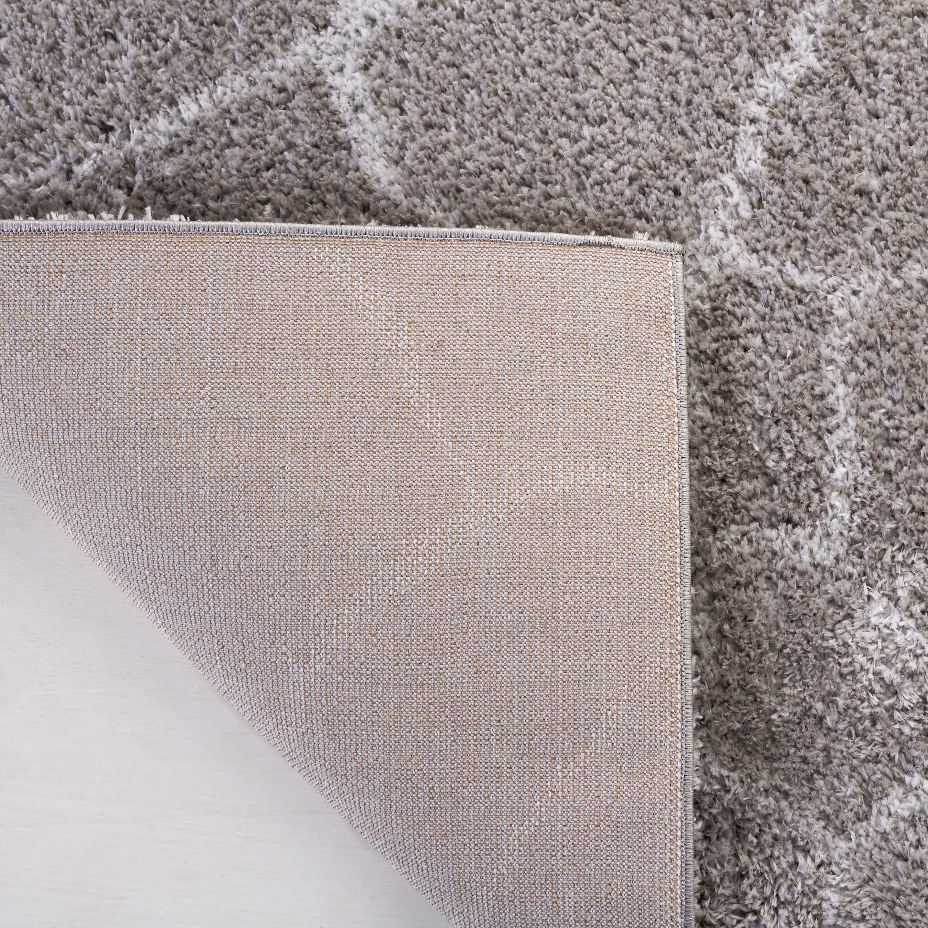 Ivory and Grey Abstract Shag 5' x 7' Synthetic Area Rug