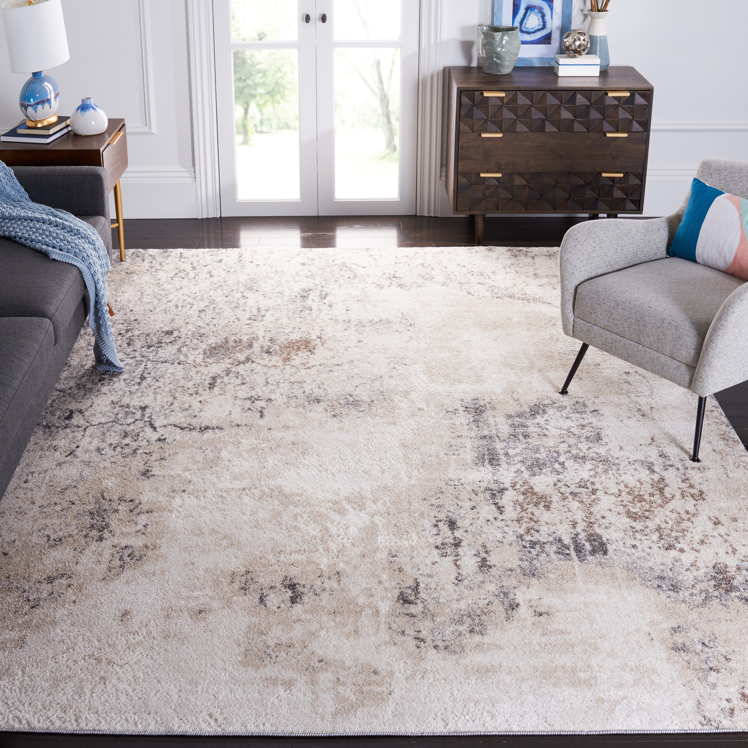 Ivory and Grey Abstract 8' x 10' Synthetic Area Rug