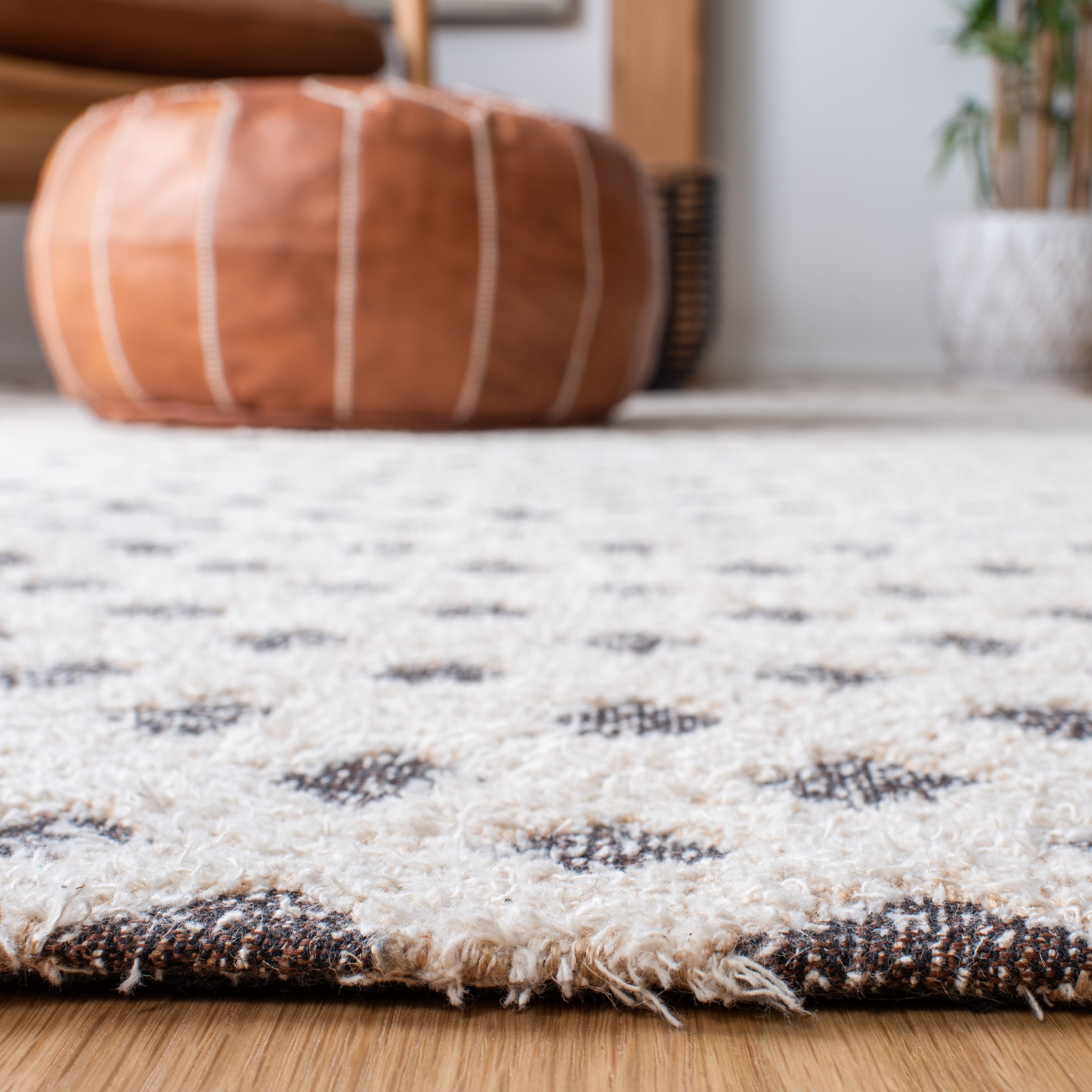 Ivory and Natural 3' x 5' Hand Woven Synthetic Area Rug