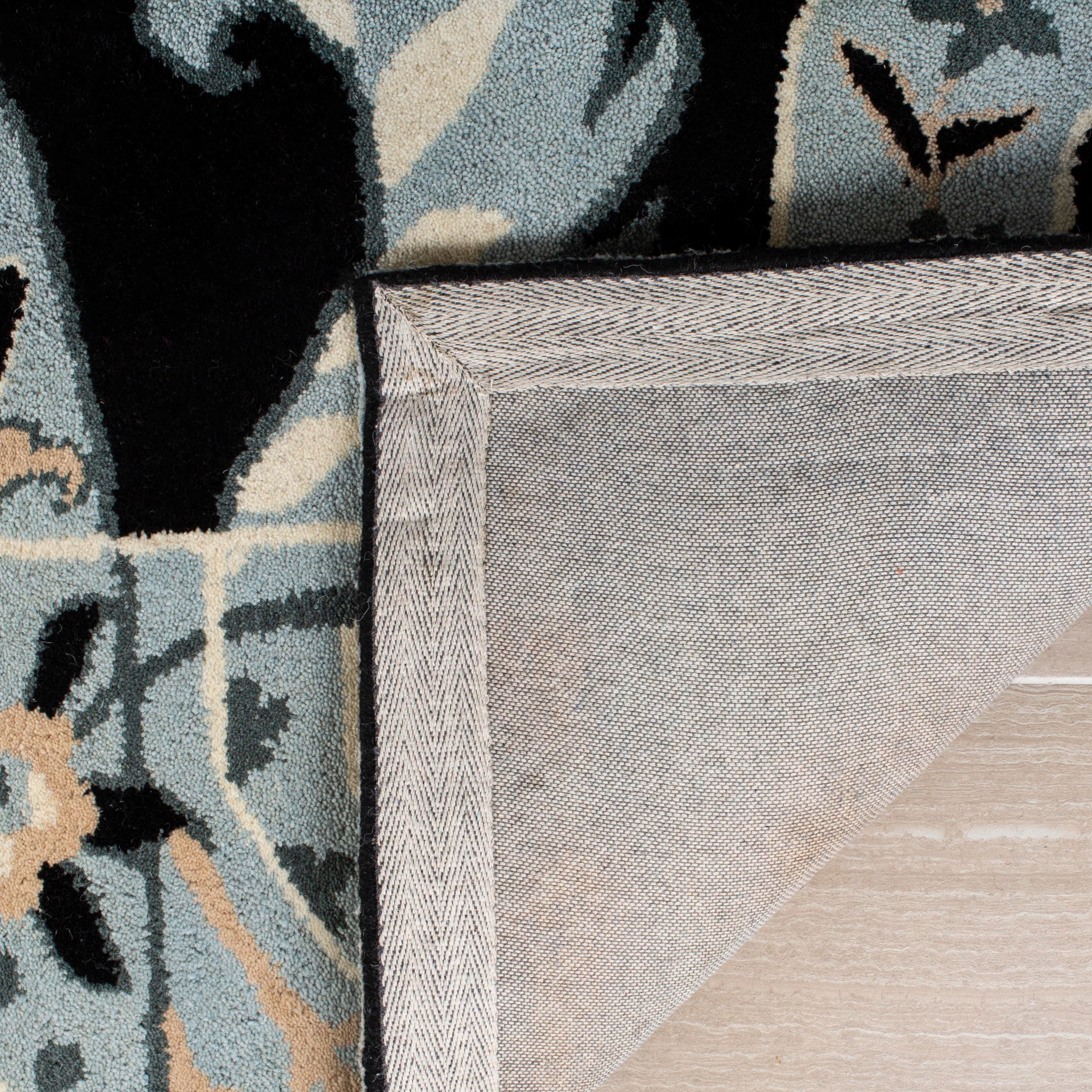 Hand-Tufted Black and Multicolor Wool Area Rug, 5' x 8'