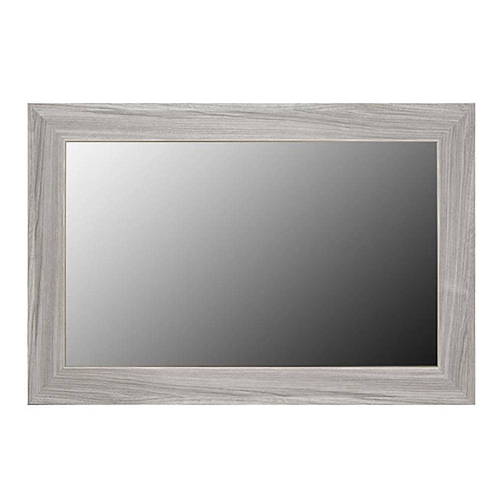 Mirror after framing it with peel and stick tile from Lowes