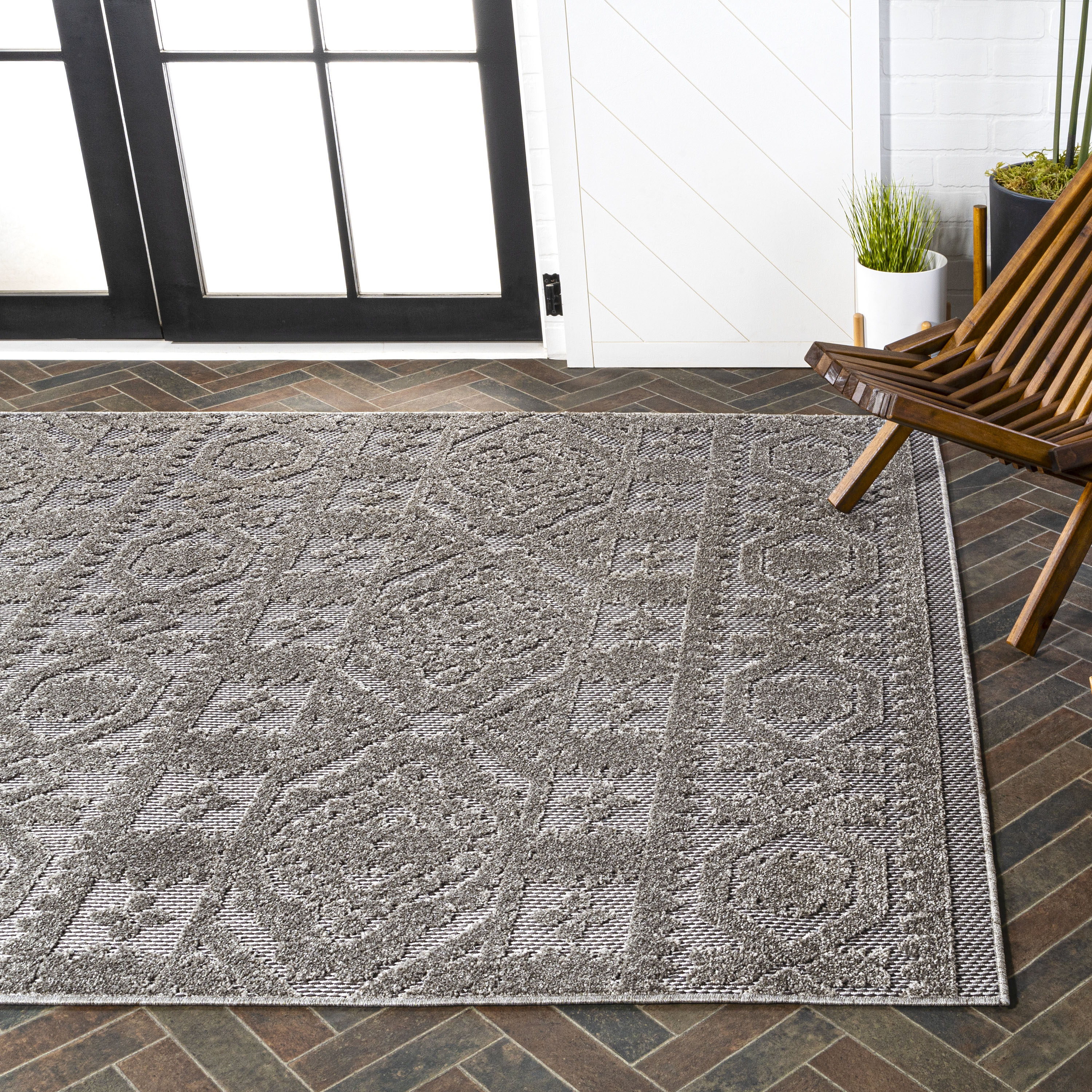 Dark Gray and Ivory Geometric Synthetic Indoor/Outdoor Area Rug