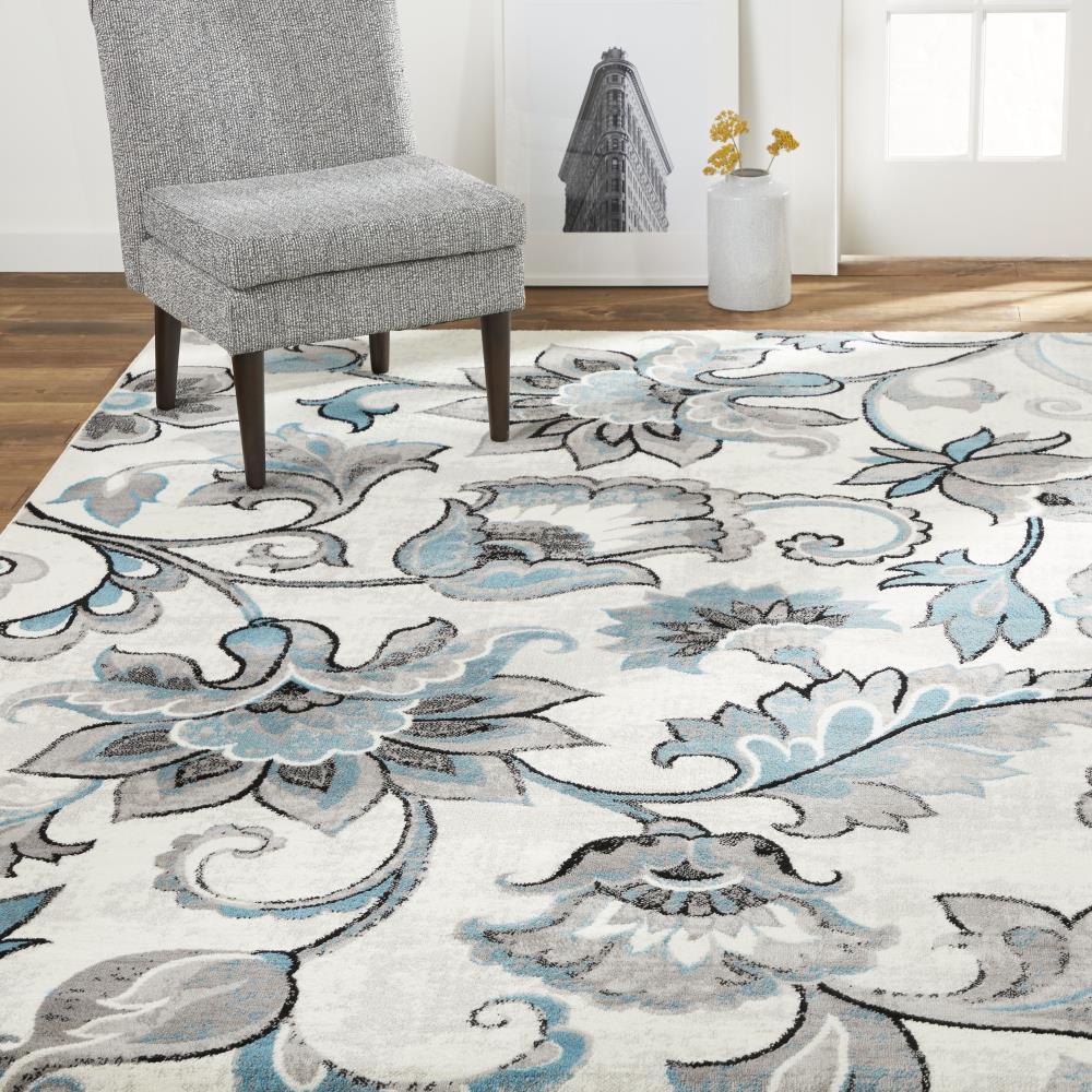 Ivory Floral Tufted 64" Synthetic Easy-Care Area Rug