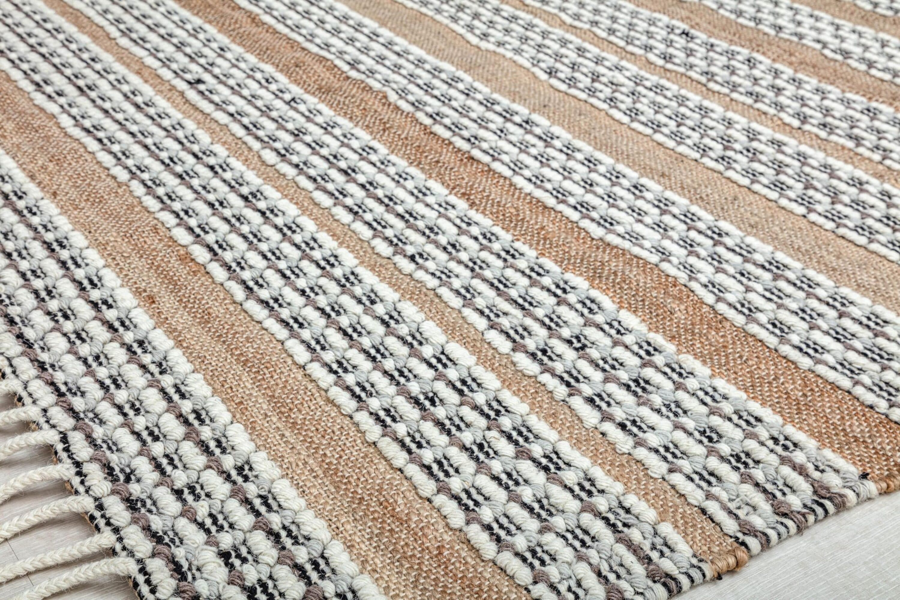 Handmade Natural Jute and Wool Striped Area Rug with Tassels