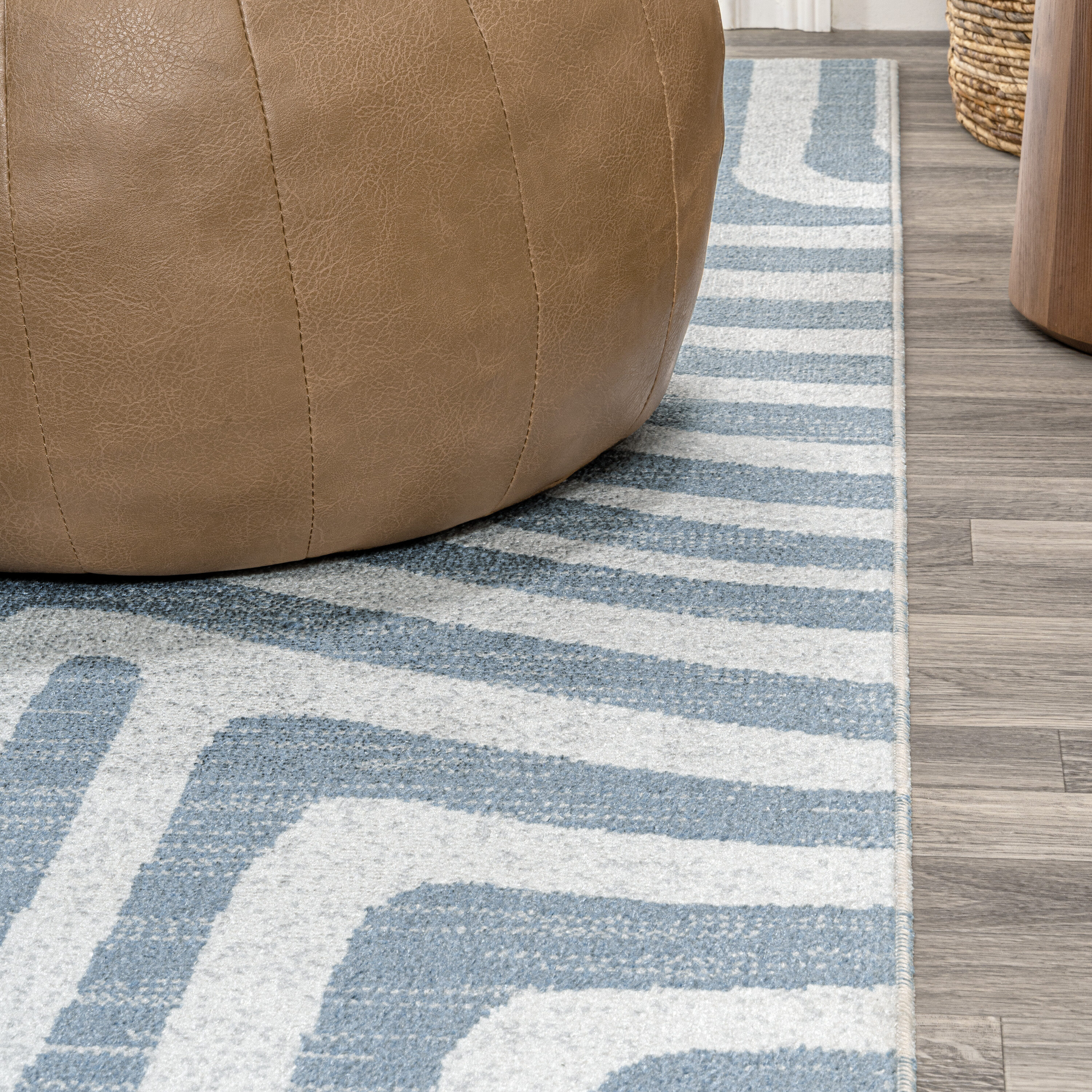 Blue and Cream Abstract Synthetic 4' x 6' Washable Area Rug