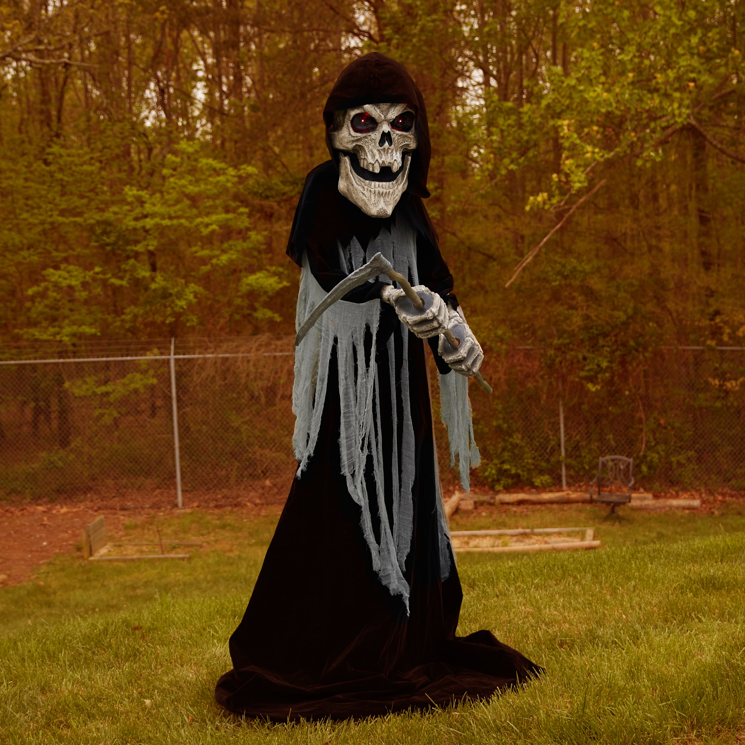 Haunted Living 4-ft Animatronic Bluetooth Reaper with Band Drums at