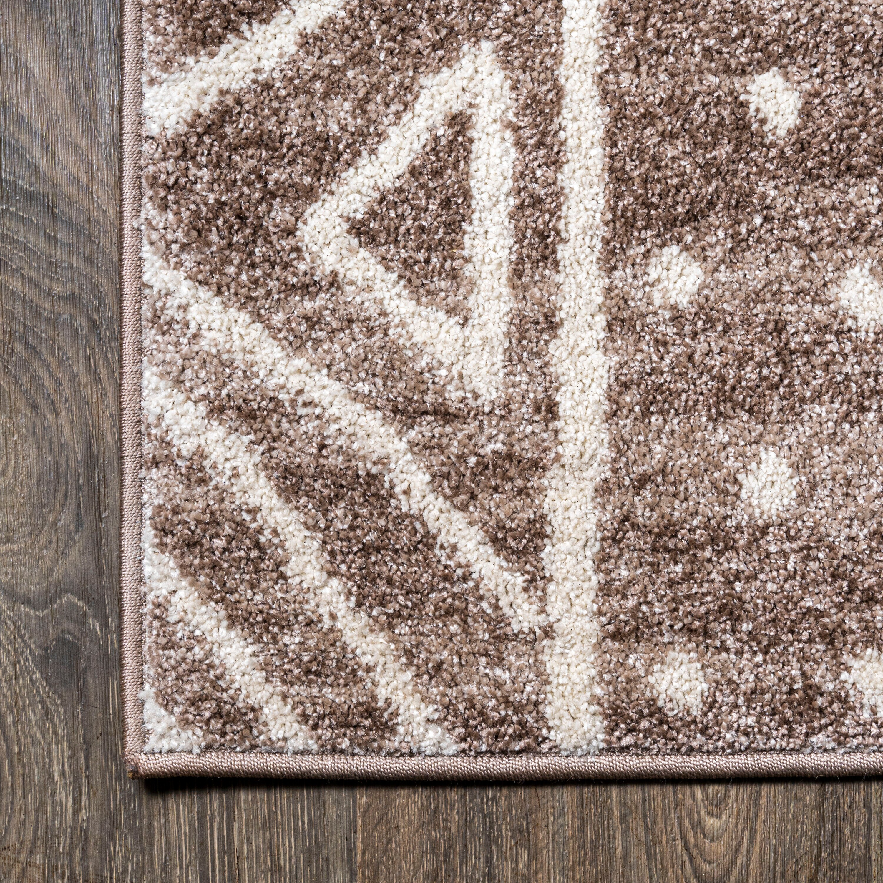 Ivory and Brown Geometric Synthetic 4' x 6' Reversible Area Rug