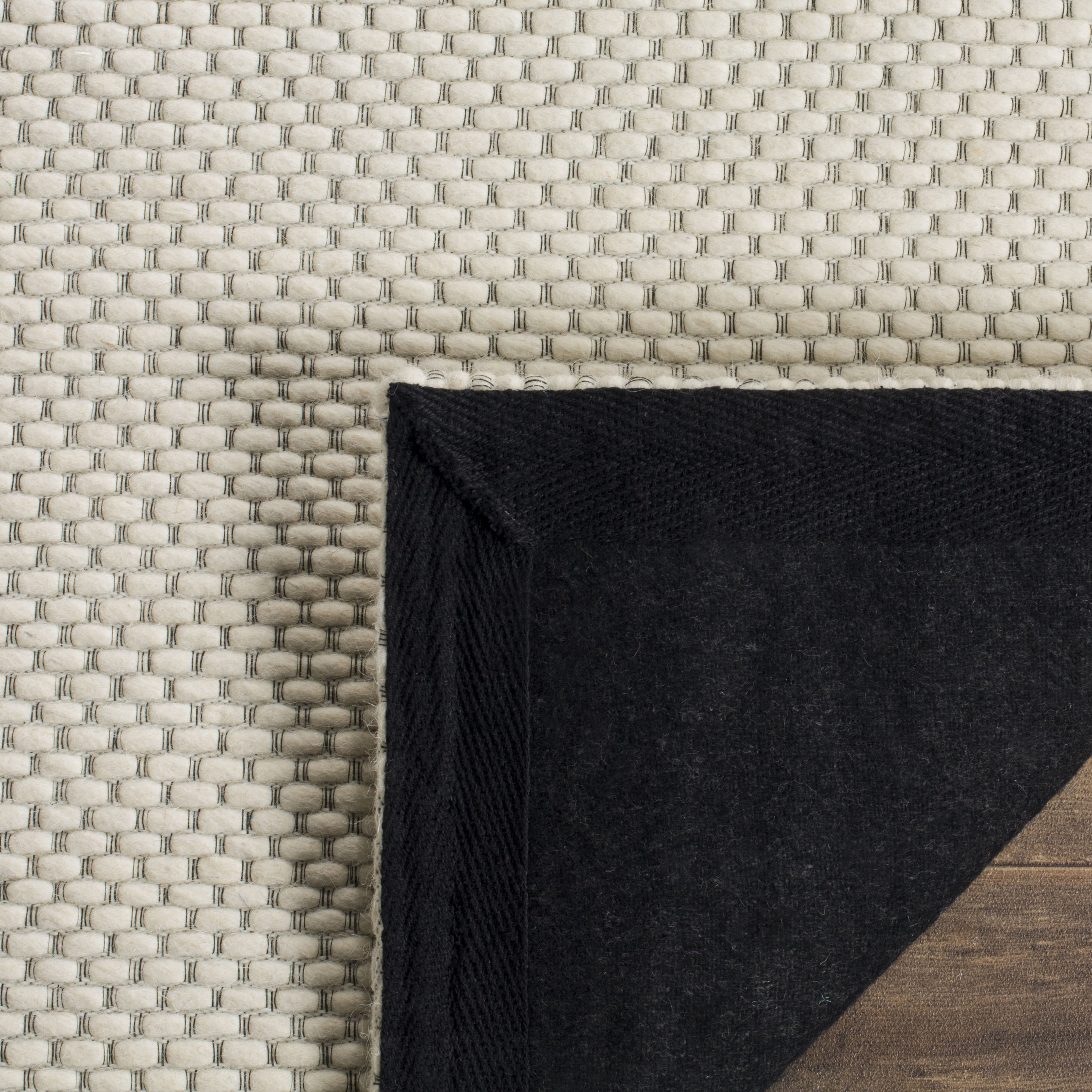Ivory Braided Hand-Tufted Wool Blend 5' x 8' Area Rug