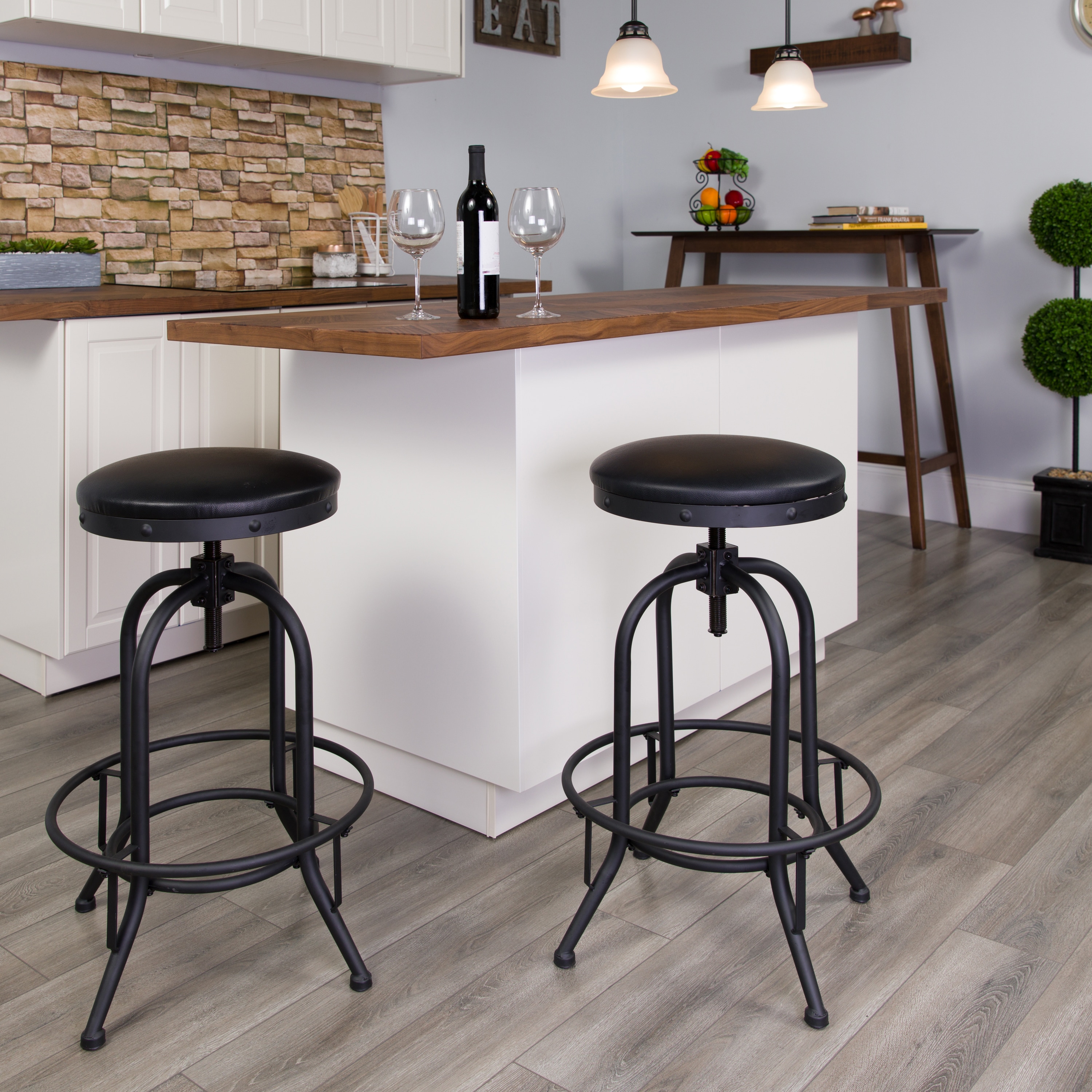 Adjustable Black Leather Swivel Backless Metal Barstool