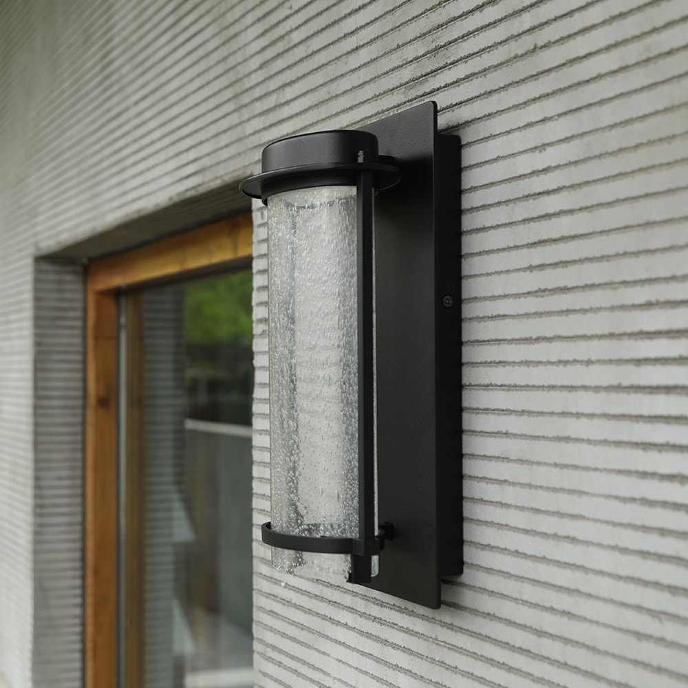 Matte Black Cylinder LED Wall Sconce with Seeded Glass