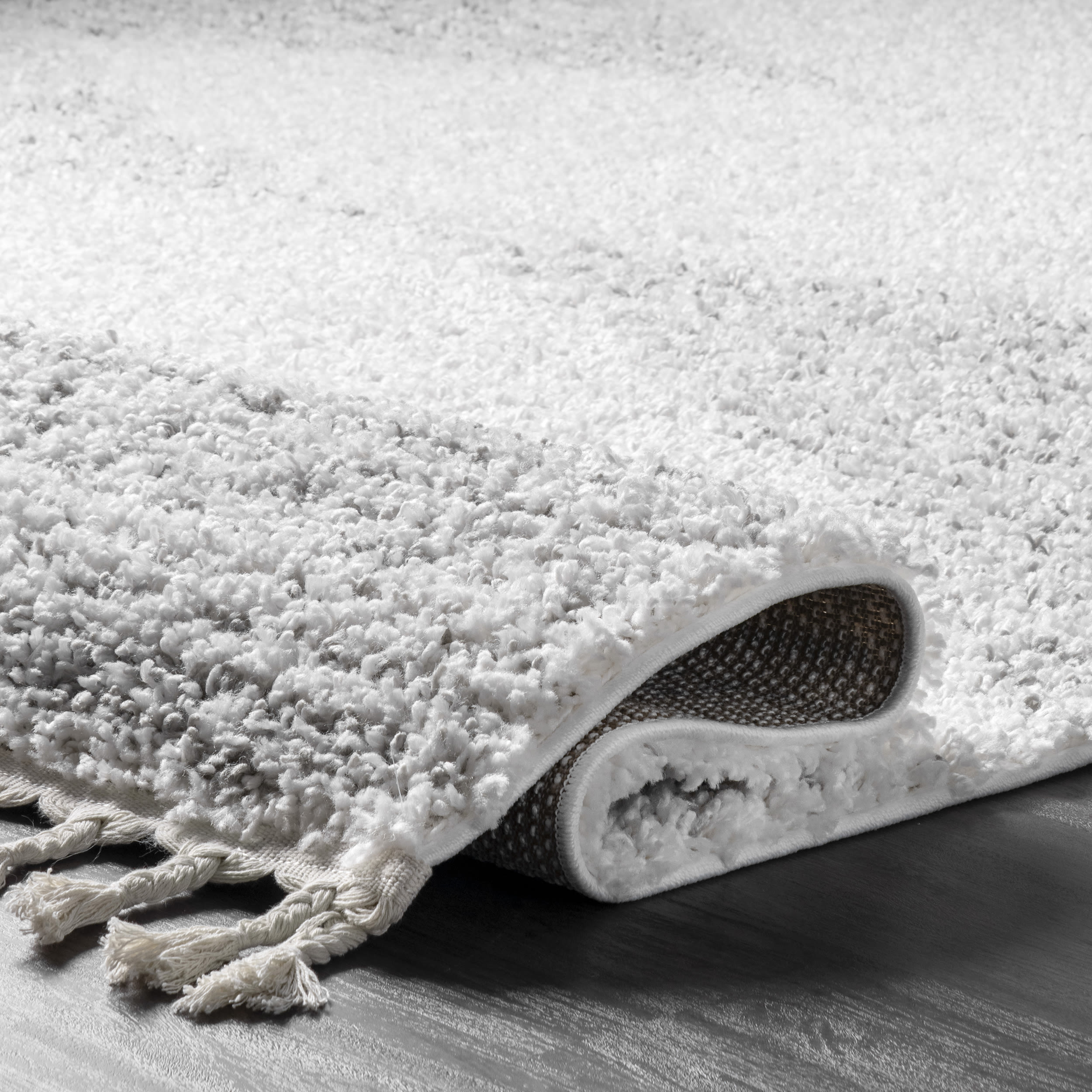 Plush White Synthetic Braided Tassel Shag Rug 5'3" x 7'7"