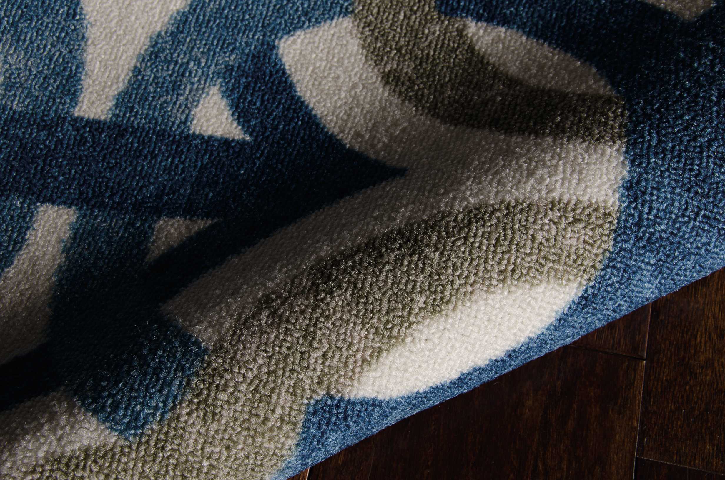 Celestial Blue and Taupe Tufted Synthetic 5' x 7' Area Rug