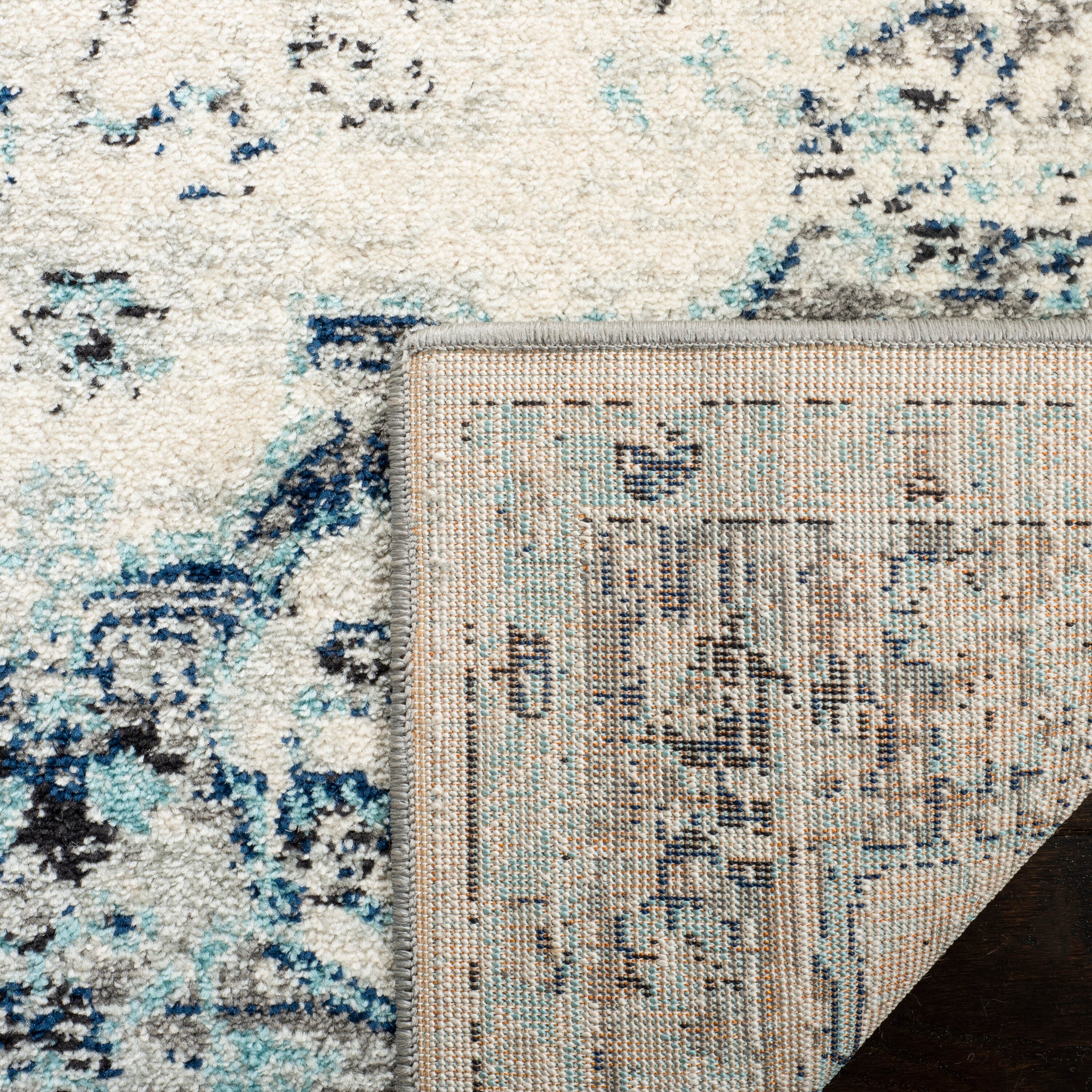 Ivory/Navy Synthetic 4' x 6' Easy-Care Stain-Resistant Area Rug
