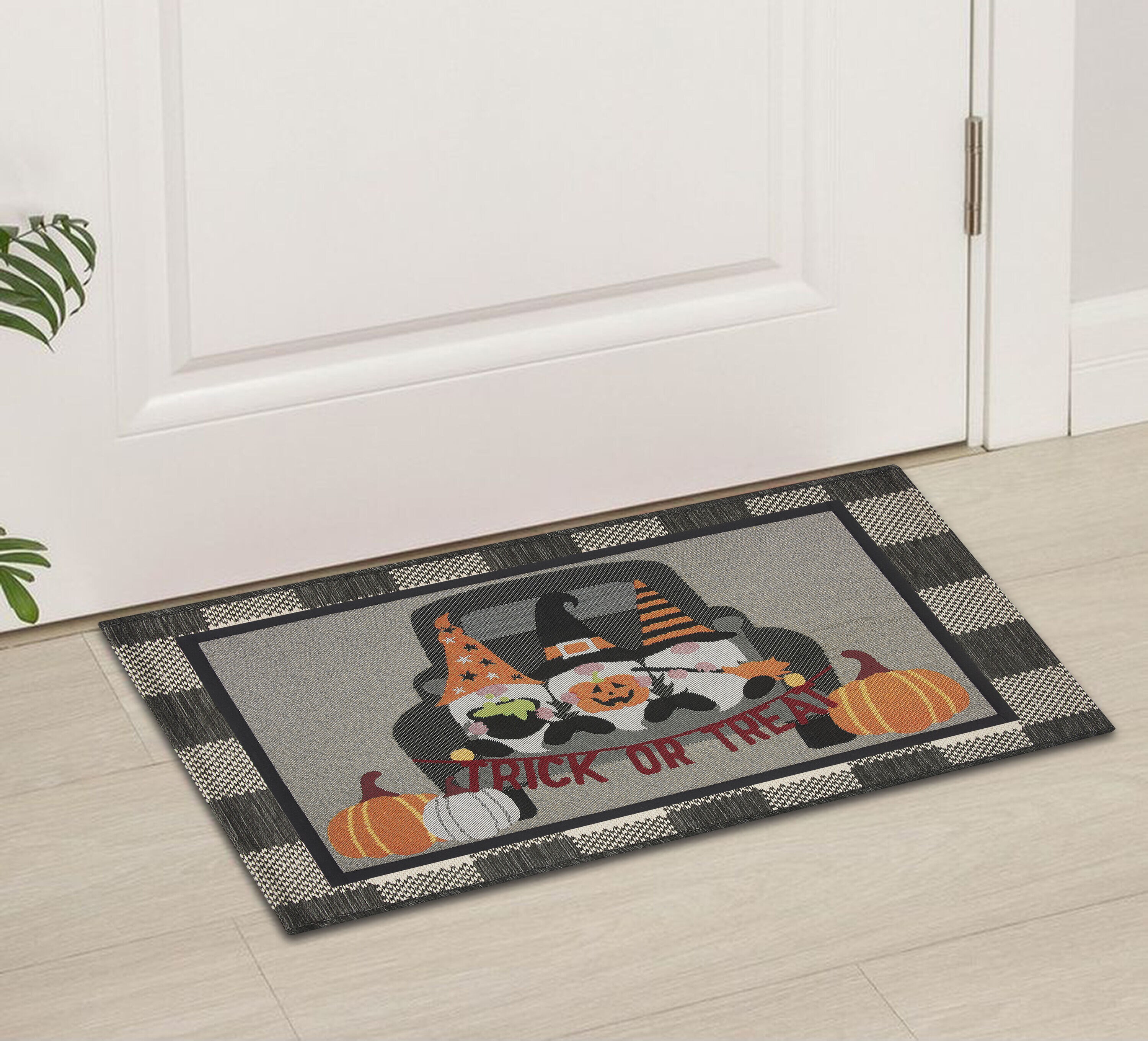 Haunted Living 2-ft x 3-ft Black Rectangular Outdoor Novelty Door Mat in  the Mats department at