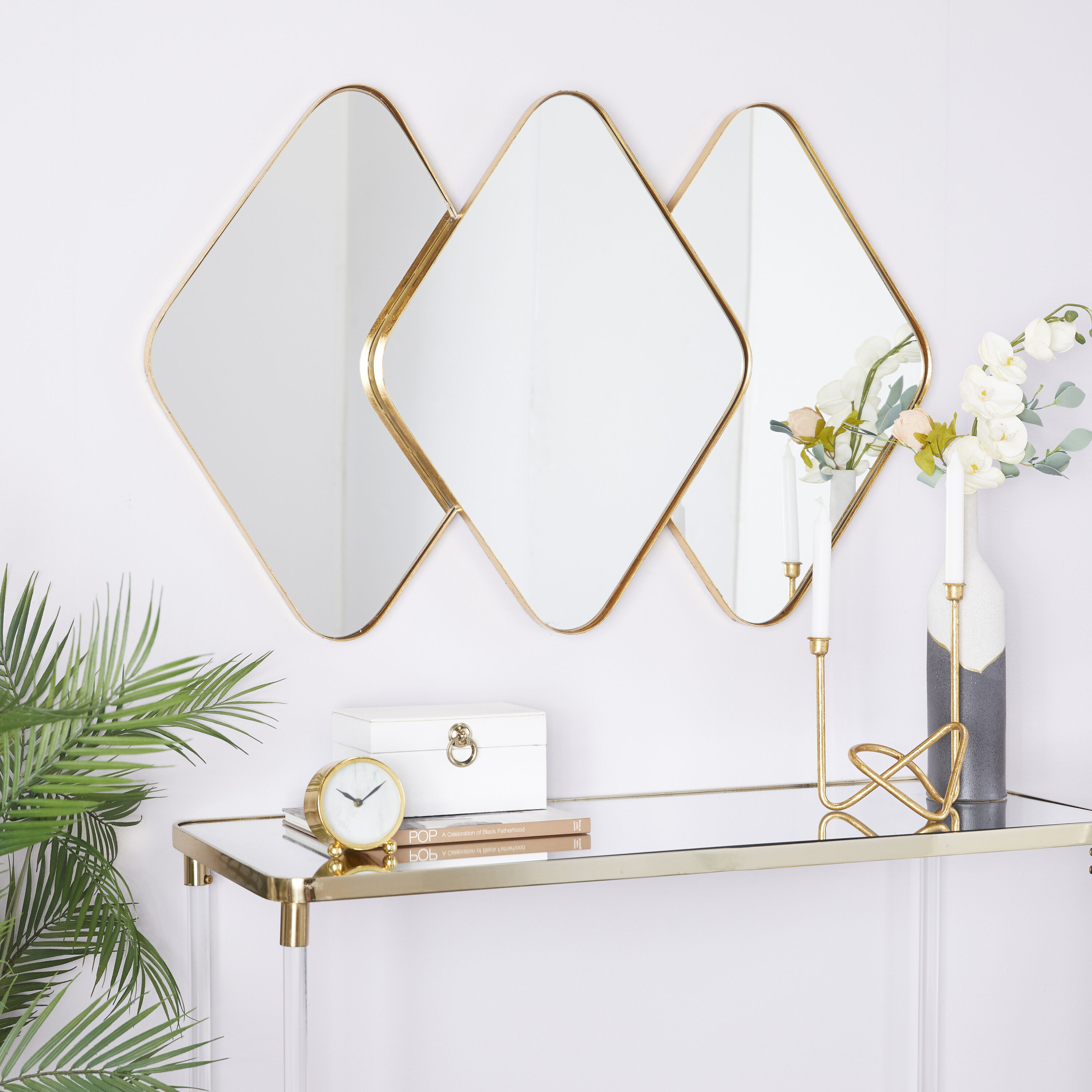CosmoLiving by Cosmopolitan 84807 43-Inches W x 27.5-Inches H Oval Gold Overlapping Diamond Framed Wall Mirror